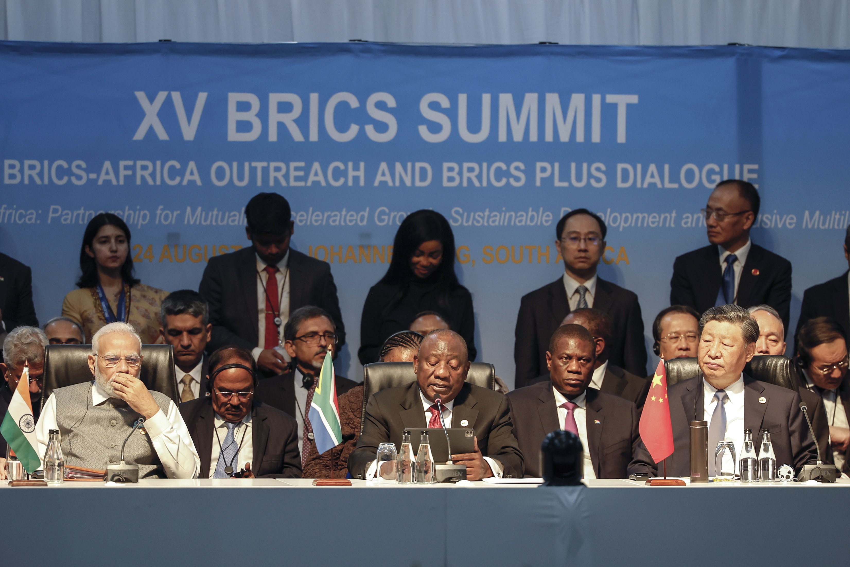 South African President Cyril Ramaphosa (front, centre) is flanked by Indian Prime Minister Narendra Modi (front, left) and Chinese President Xi Jinping (front, right) at the 15th Brics Summit in Johannesburg, South Africa, on August 24, where Global South countries pushed for “true multilateralism”. Photo: EPA-EFE