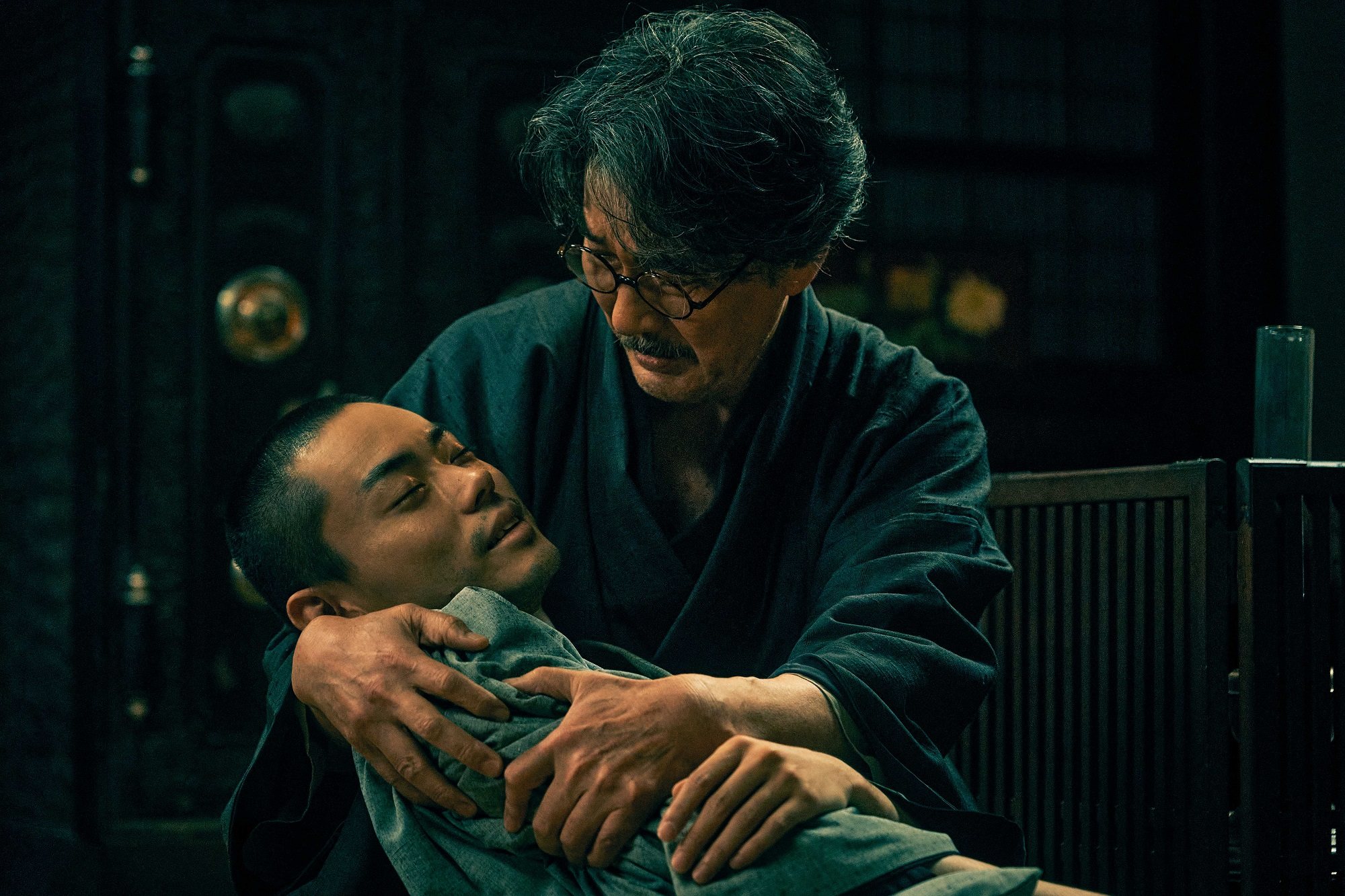 Koji Yakusho (top) and Masaki Suda in a still from “Father of the Milky Way Railroad”.