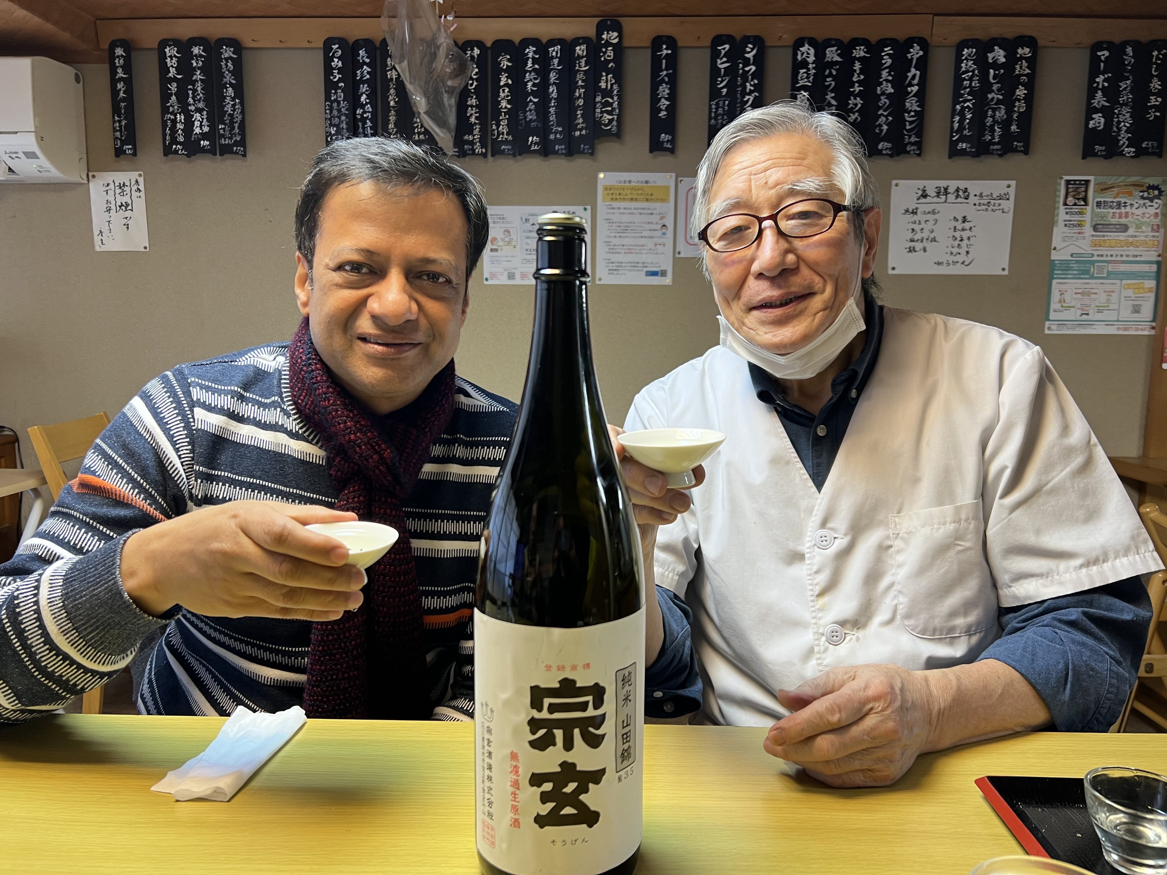 Ravi Joshi tastes sake with a renowned sake master in Japan. Photo: Sake Club of India