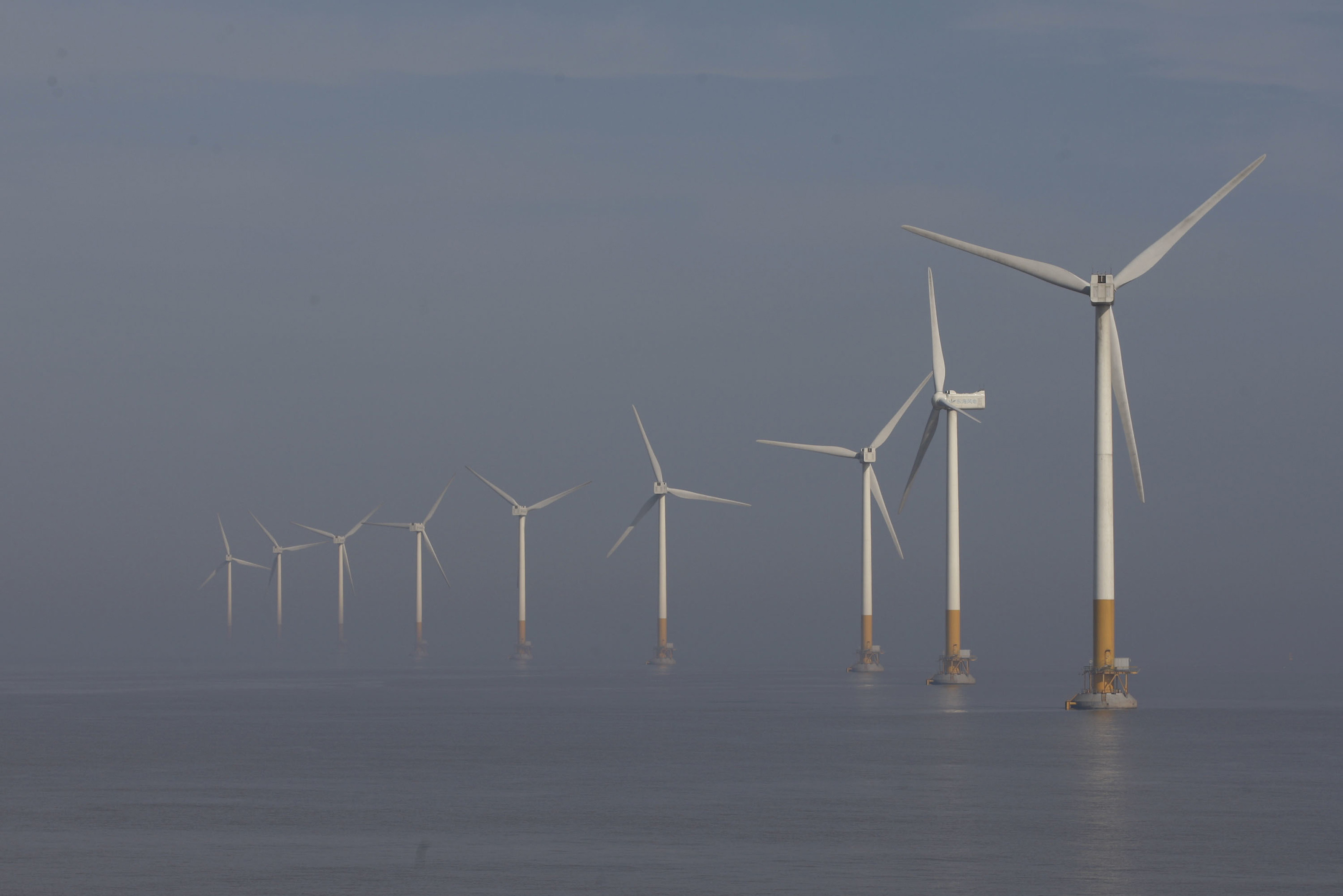 China added 11,098 wind turbines last year, with a total capacity of 49.83 million kW. Some 10 per cent of those were offshore. Photo: Chinatopix via AP