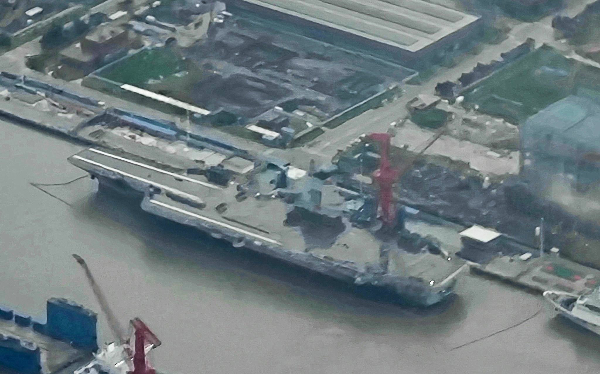 All covers appear to have been removed from  the three advanced electromagnetic catapults on the Fujian flight deck. Photo: Weibo