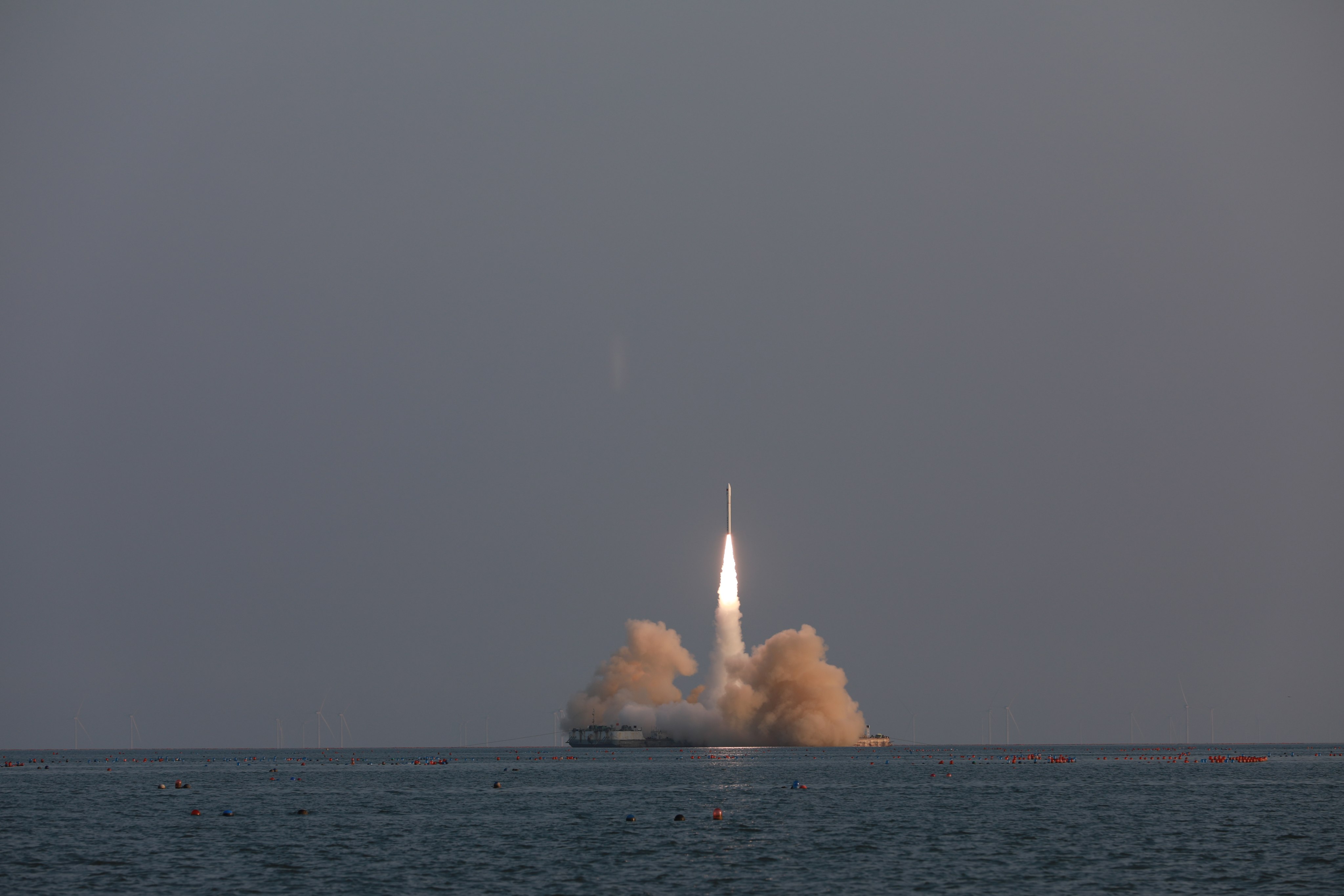 The commercial launch vehicle Ceres-1, carrying four satellites, blasts off from waters near Haiyang in Shandong province on Tuesday. Photo: EPA-EFE/Xinhua