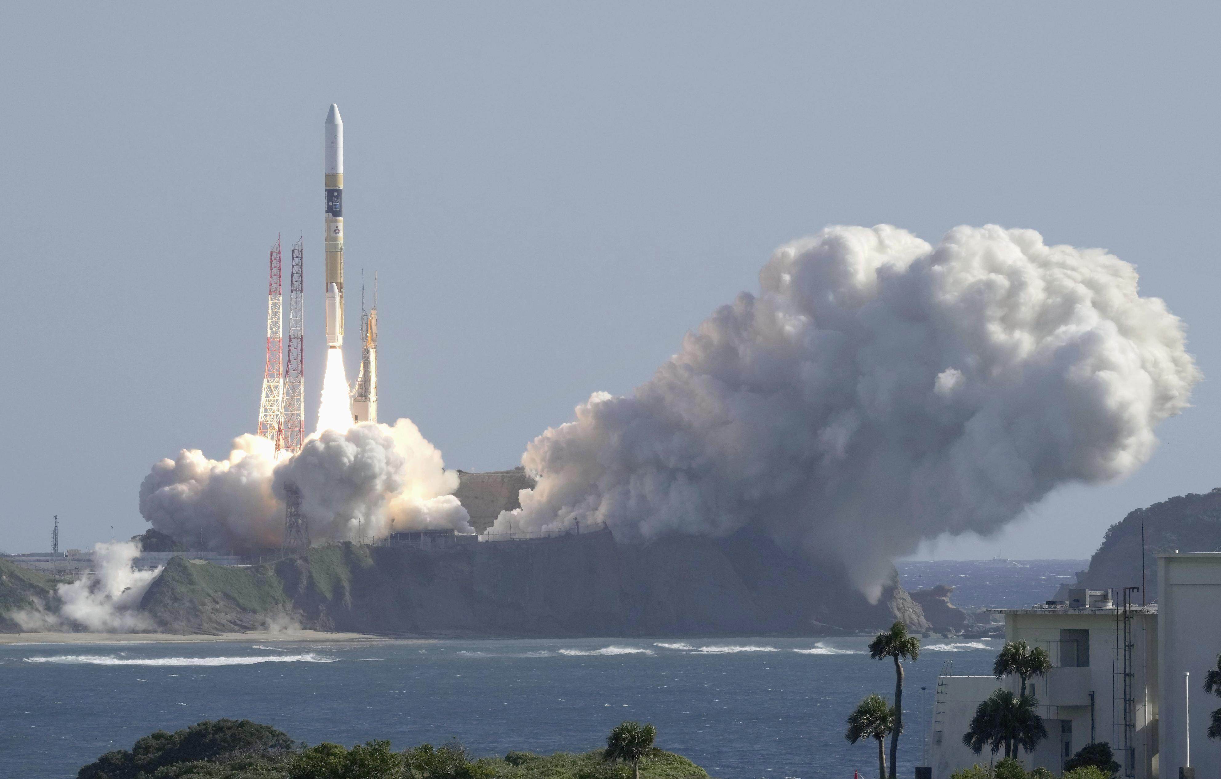 An HII-A rocket blasts off from the launch pad at Tanegashima Space Centre in Kagoshima, Japan on Thursday. Photo: AP