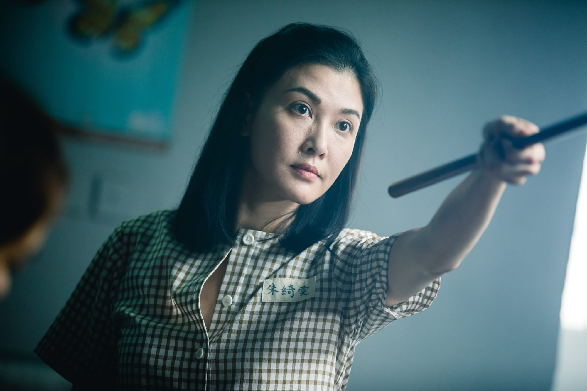 Rain Li as psychopathic repeat offender Butcher Wan in a still from “Prison Flowers”.