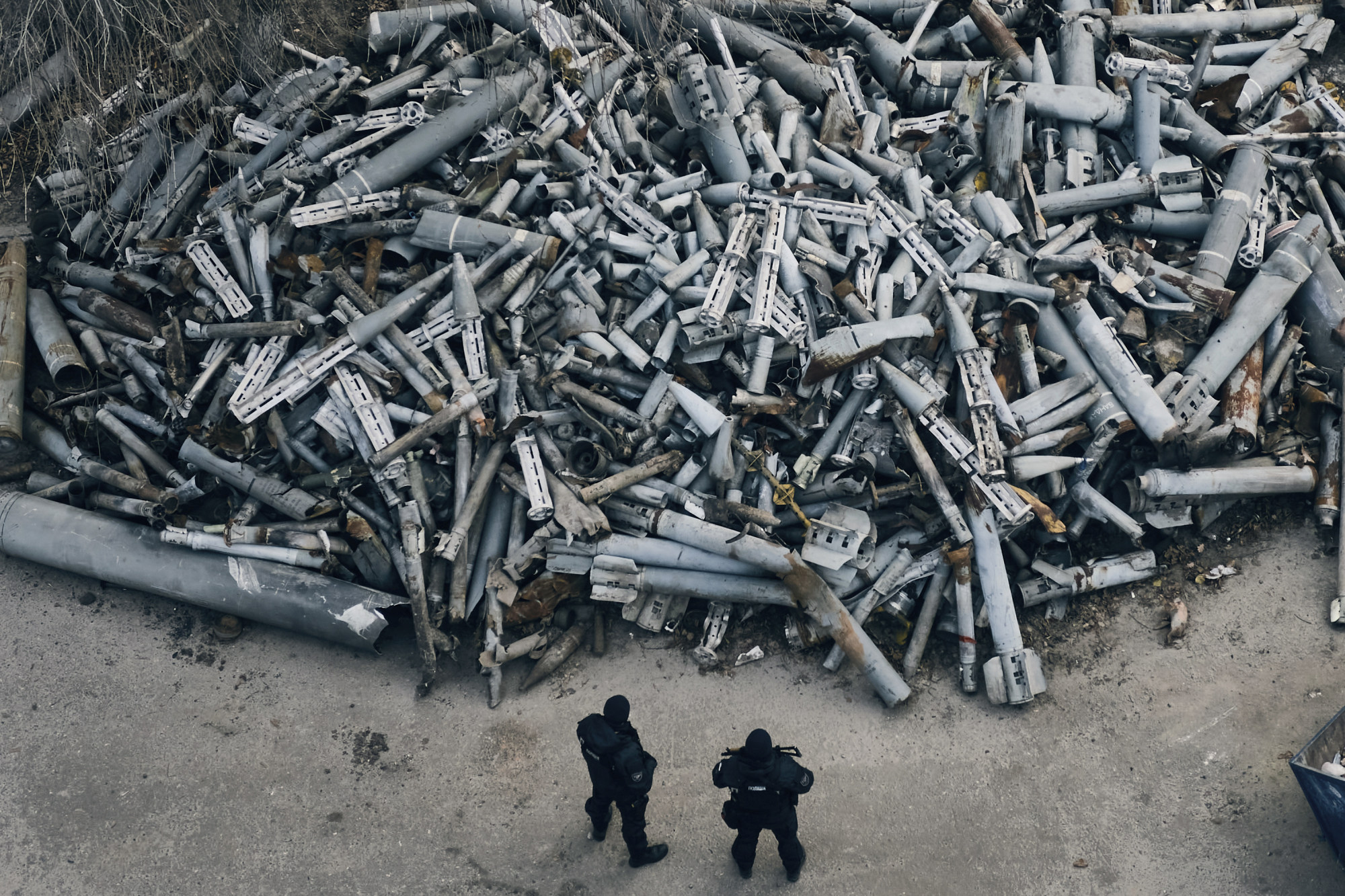 Police officers look at collected fragments of Russian rockets that hit Kharkiv in Ukraine. File photo: AP