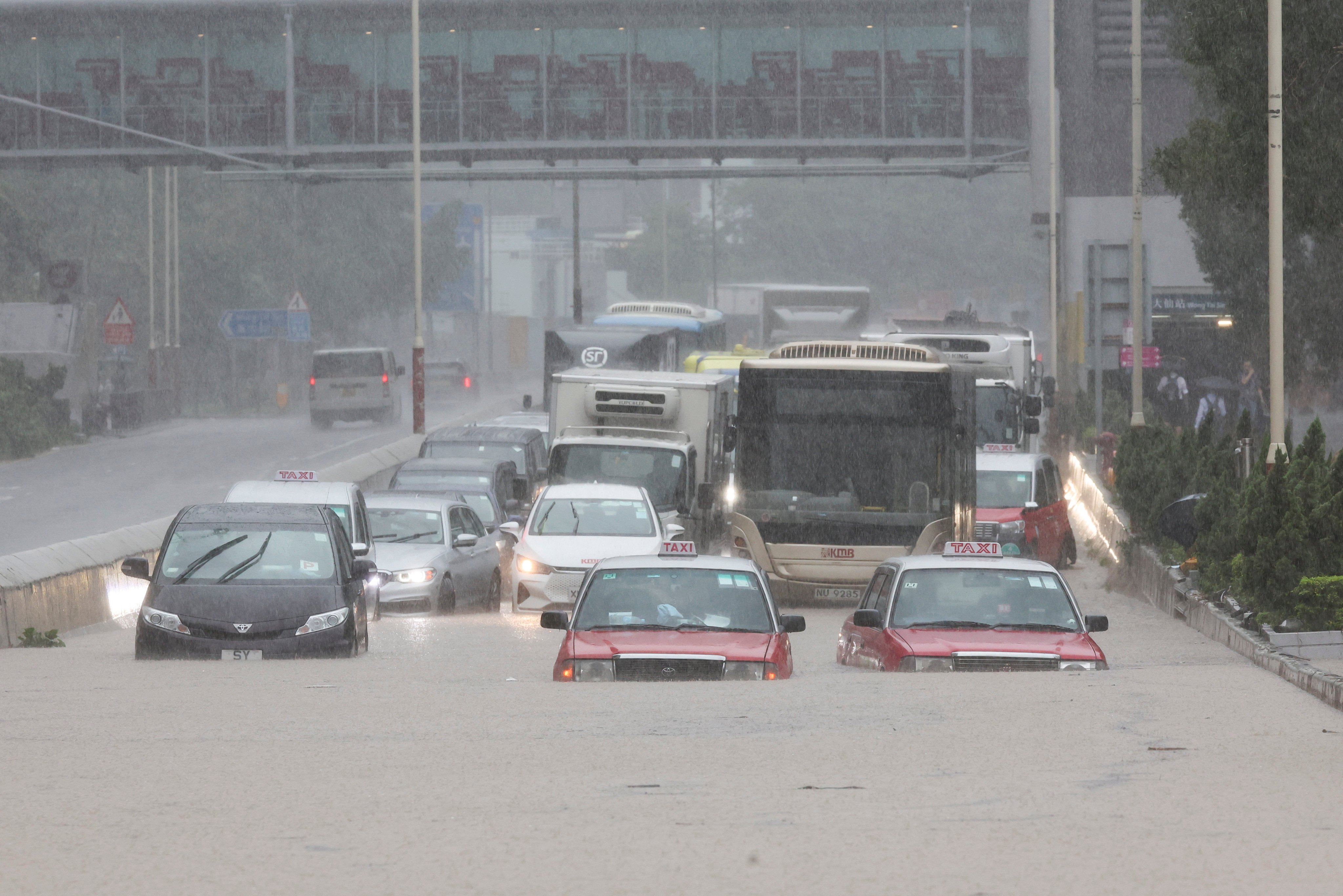 Vehicles partially submerged on Lung Cheung Road as Hong Kong grapples with one of its most serious flooding events ever. Photo: Edmond So 