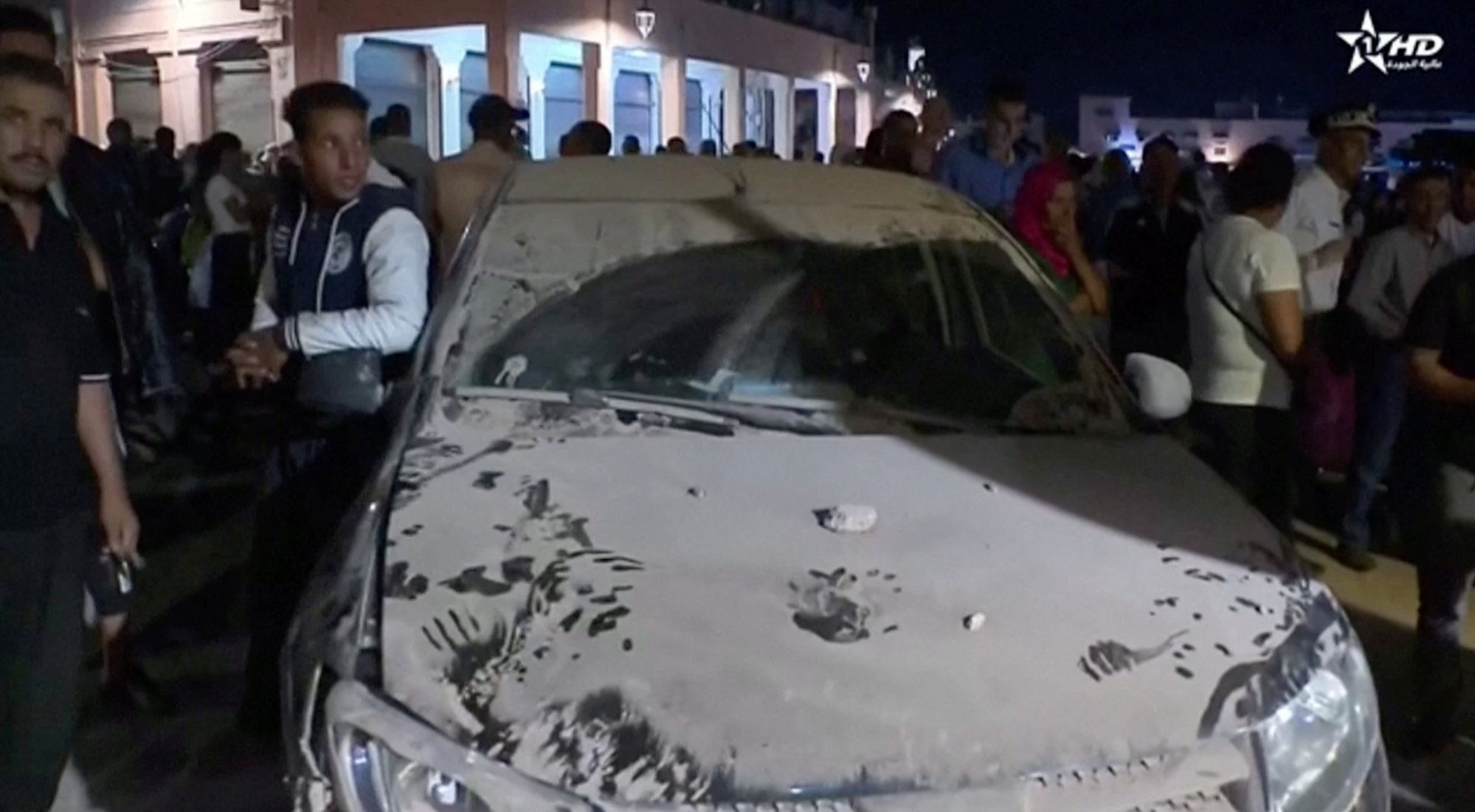 A car is covered in dust in the aftermath of the earthquake in Marrakech, Morocco, on Saturday. Photo: Al Oula TV/Handout via Reuters