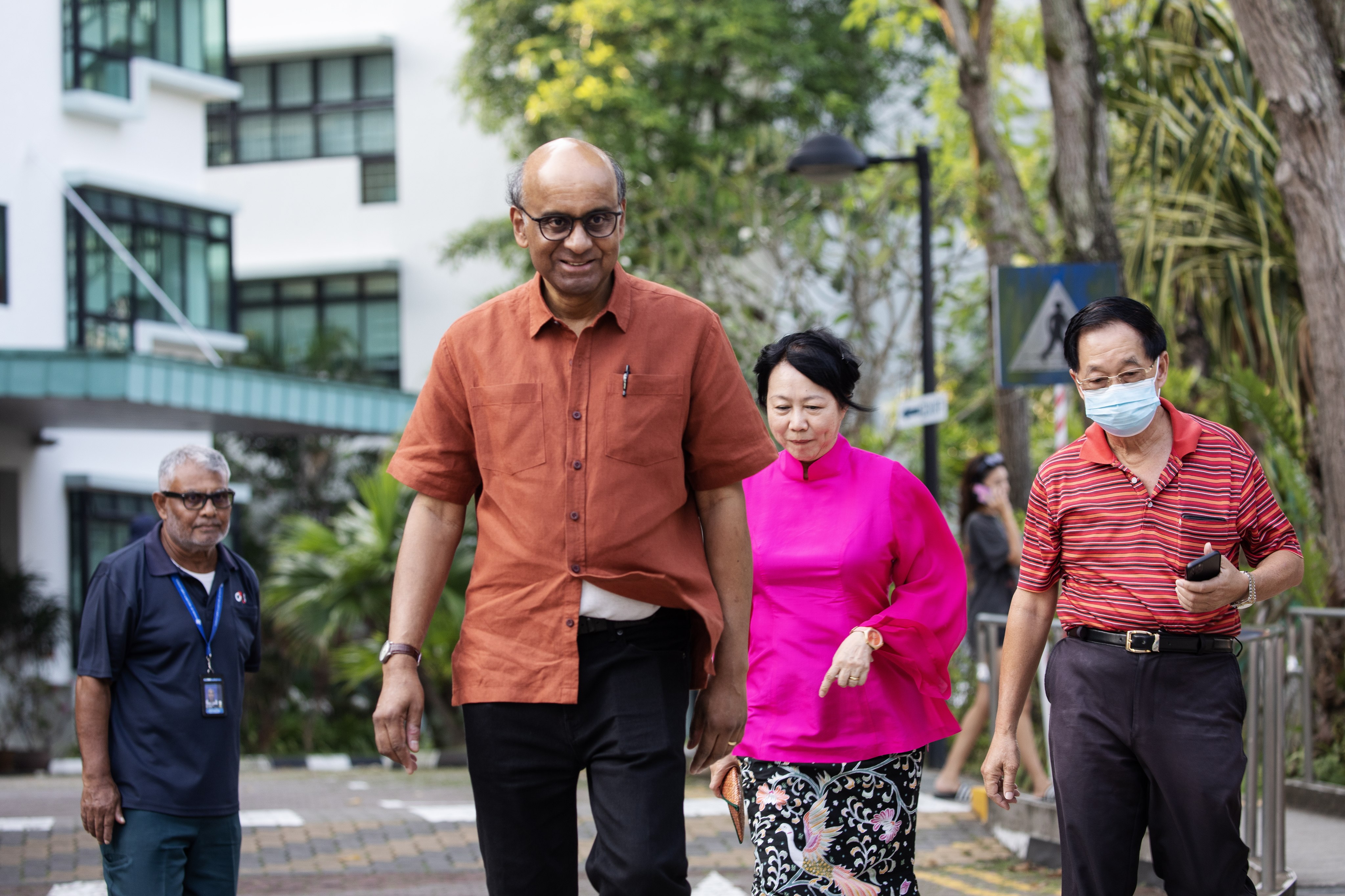 Singaporean presidential election victor Tharman Shanmugaratnam and his wife, Jane Yumiko Ittogi, leave a polling station after casting their votes on September 1. He is the first non-Chinese candidate to win a constested presidential election. Photo: EPA-EFE