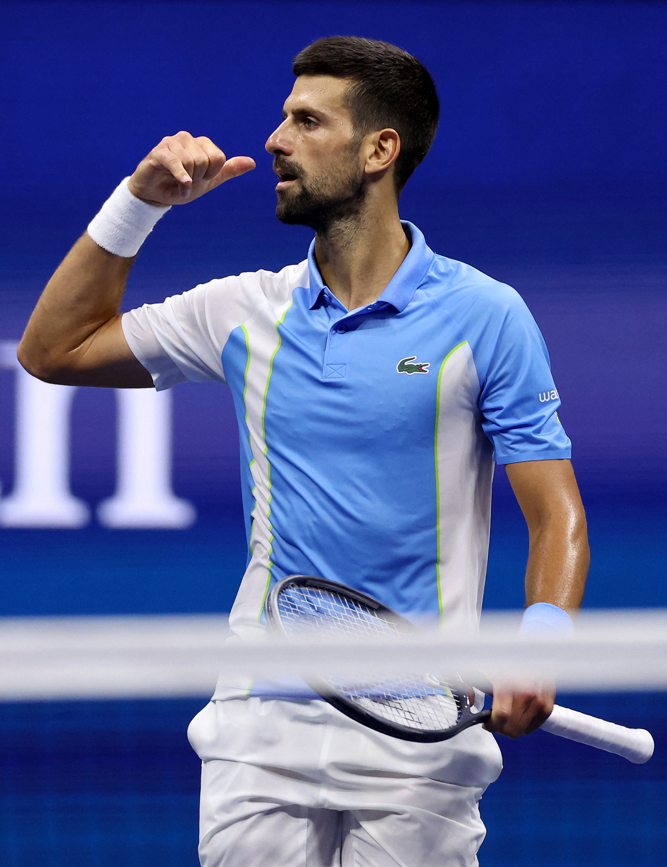 Novak Djokovic imitates Ben Shelton’s trademark on-court celebration after beating him. Photo: AFP