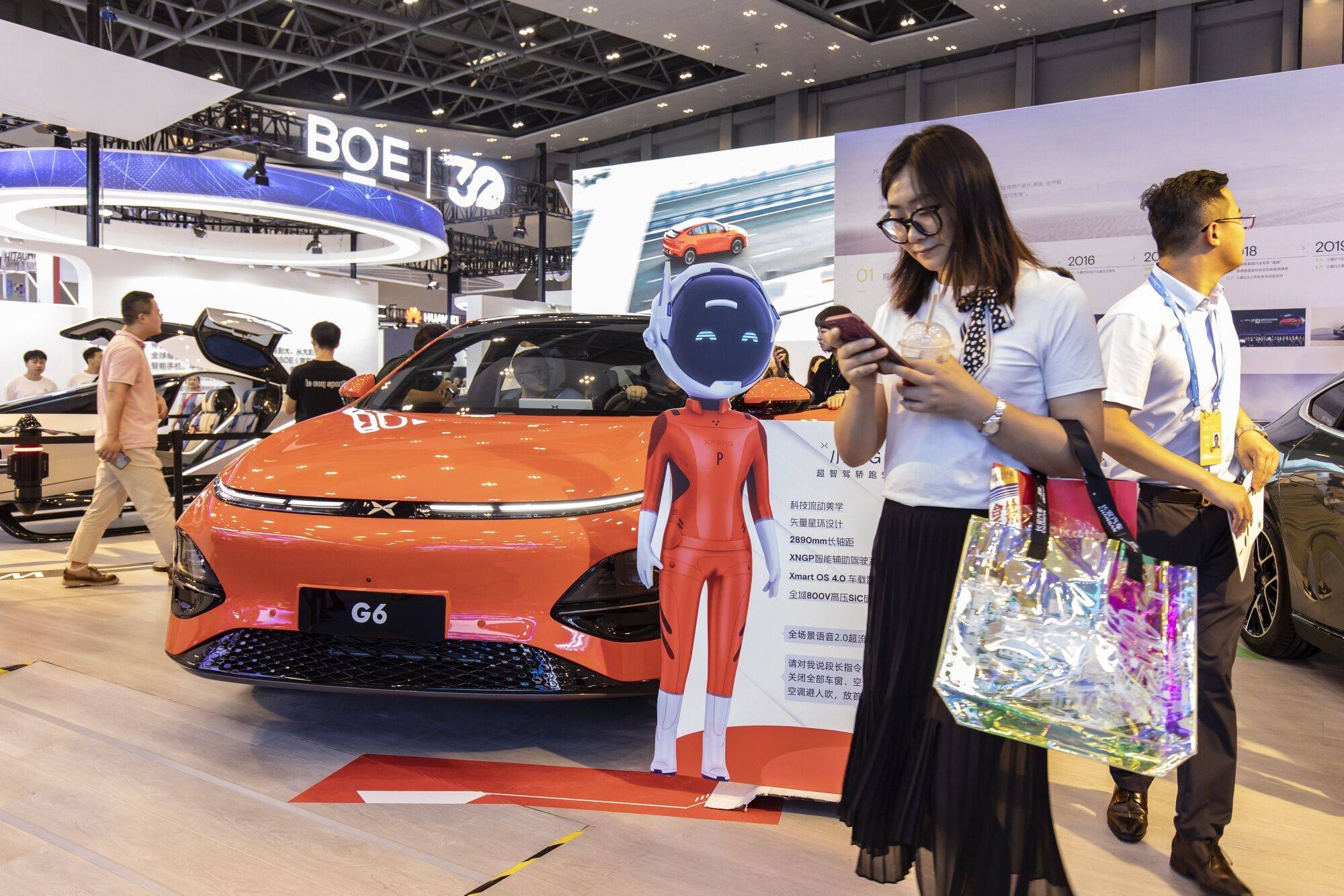 An Xpeng G6 electric vehicle is displayed at the Smart China Expo in Chongqing, China, on September 4, 2023. Photo: Bloomberg