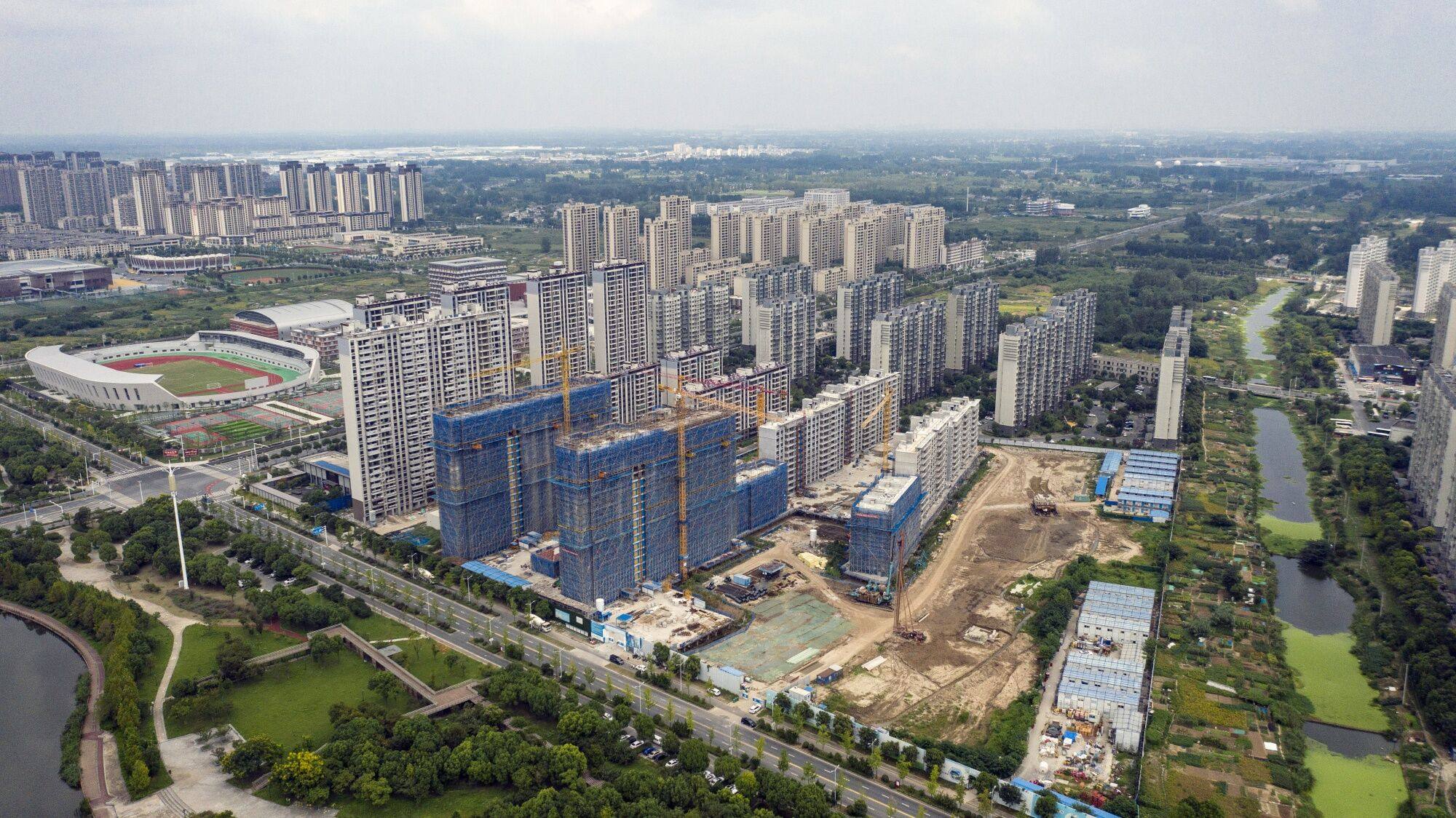 Residential buildings in Yangzhou. China’s housing market is struggling from an onslaught of property developer defaults and weak buyer demand. Photo: Bloomberg