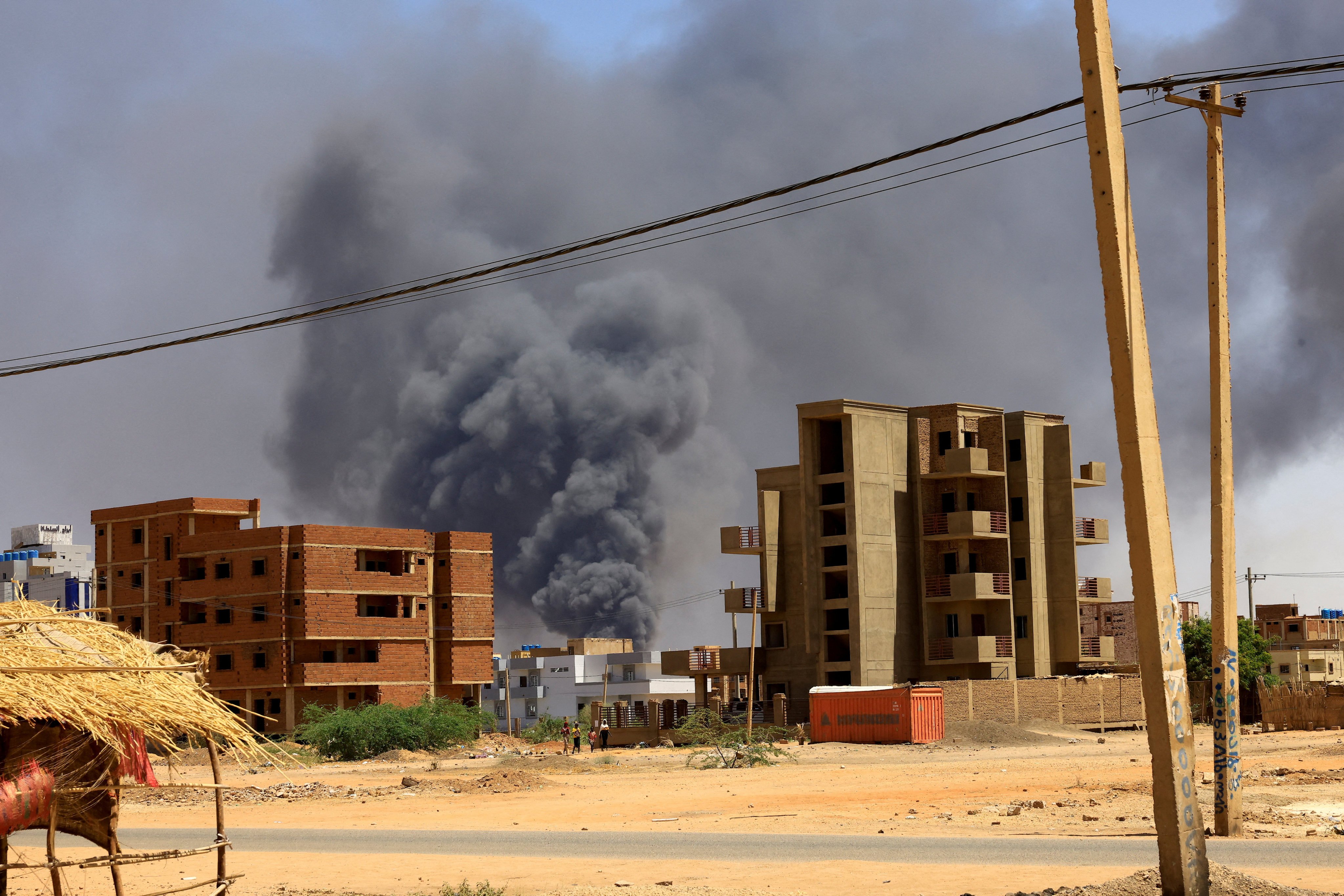 Smoke rises above buildings after an aerial bombardment in Khartoum, Sudan in May. On Sunday, air strikes killed at least 46 people and injured dozens at a Khartoum market. File photo: Reuters