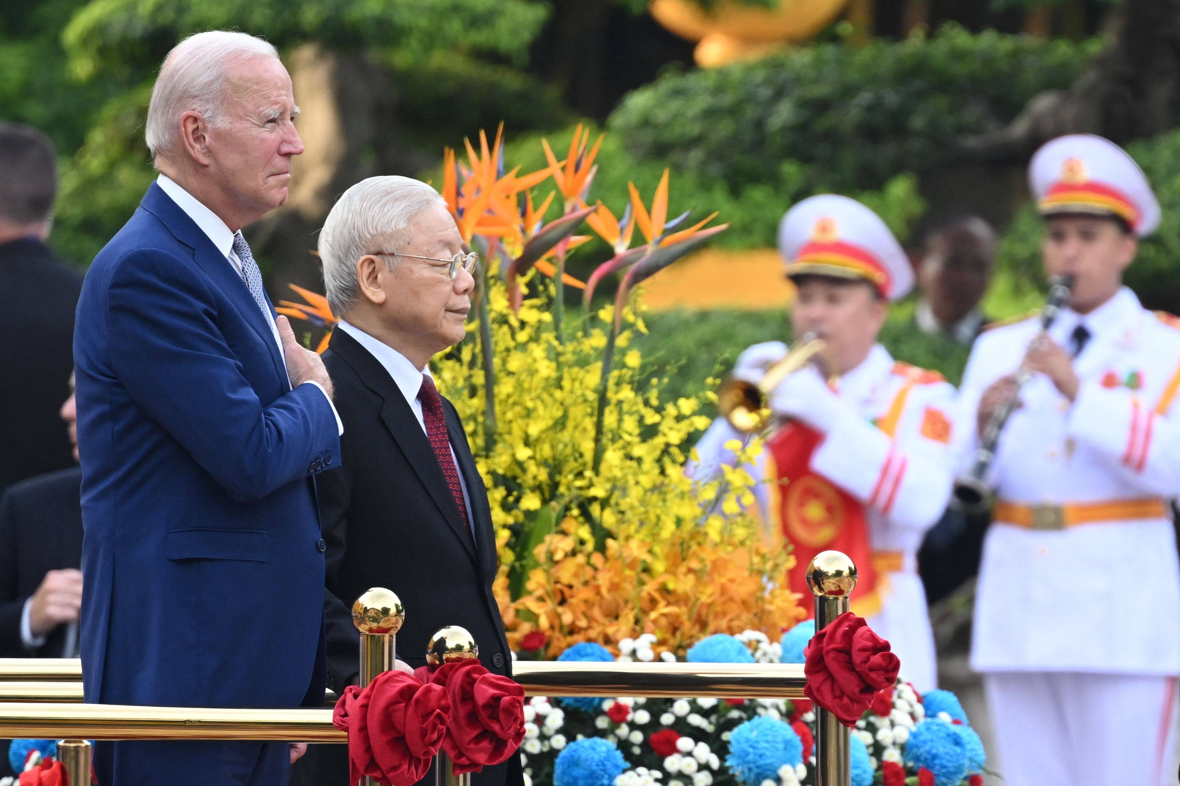 Nguyen Phu Trong, general secretary of the Vietnamese Communist Party (right) at a welcome ceremony for US President Joe Biden (left) in Hanoi on Sunday. Photo: AFP