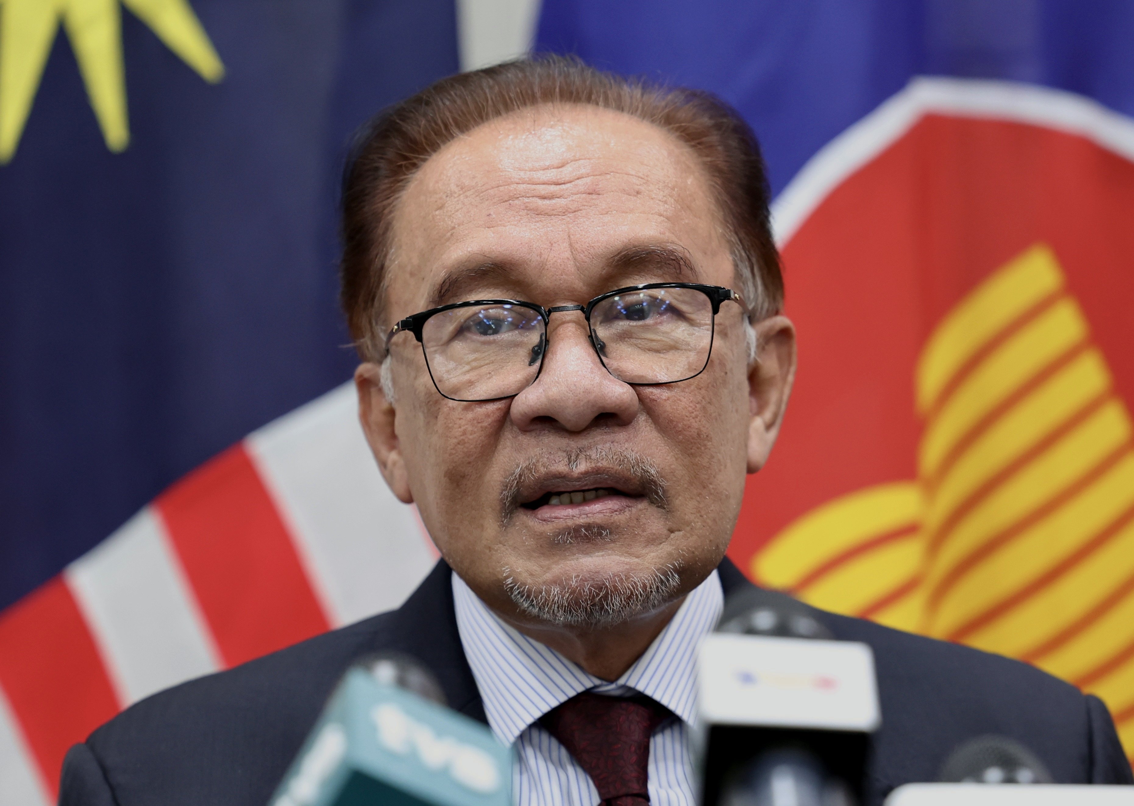 Malaysian Prime Minister Anwar Ibrahim speaks to the media last week after a session of the 43rd Asean Summit in Jakarta. Despite exiting Anwar’s coalition, Syed Saddiq’s party said it would continue supporting the government’s reform efforts from the opposition bench when a supermajority is needed. Photo: Bernama/dpa