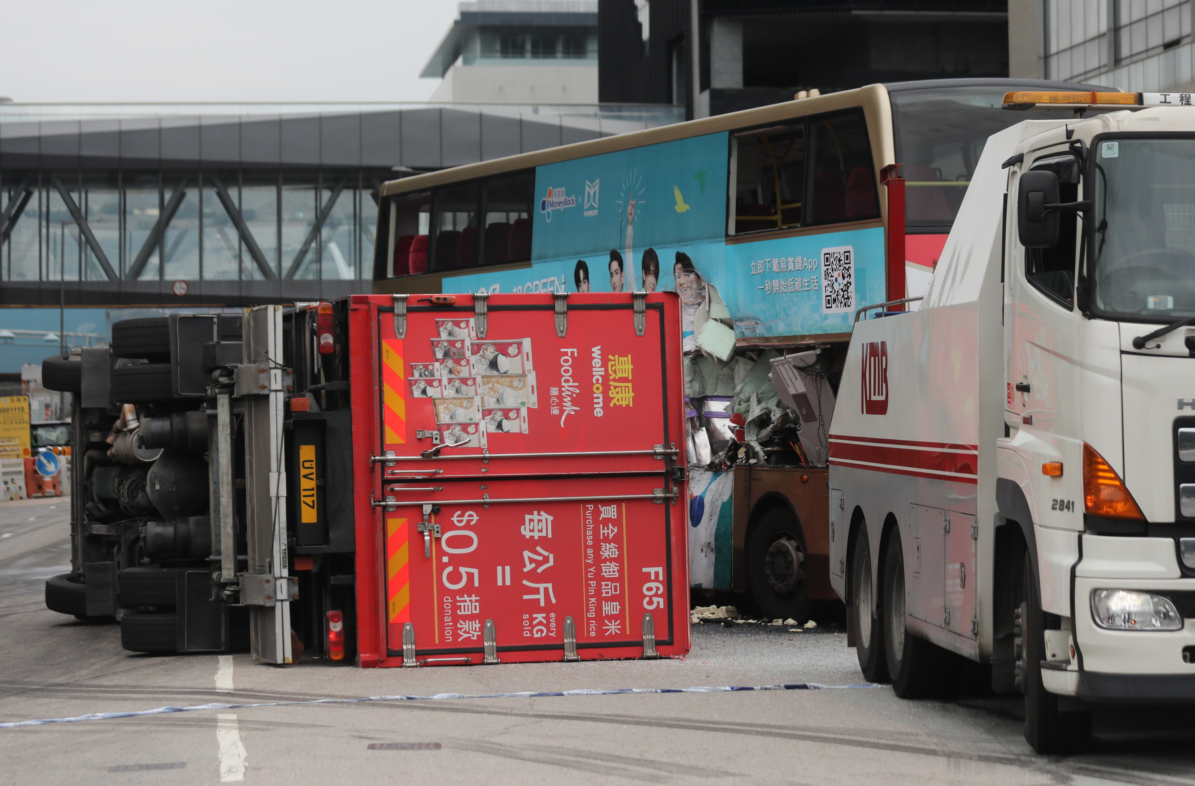 A truck lies on its side after it crashed into a KMB bus at the Tseung Kwan O Industrial Estate in Tseung Kwan O on April 7. Photo: Xiaomei Chen