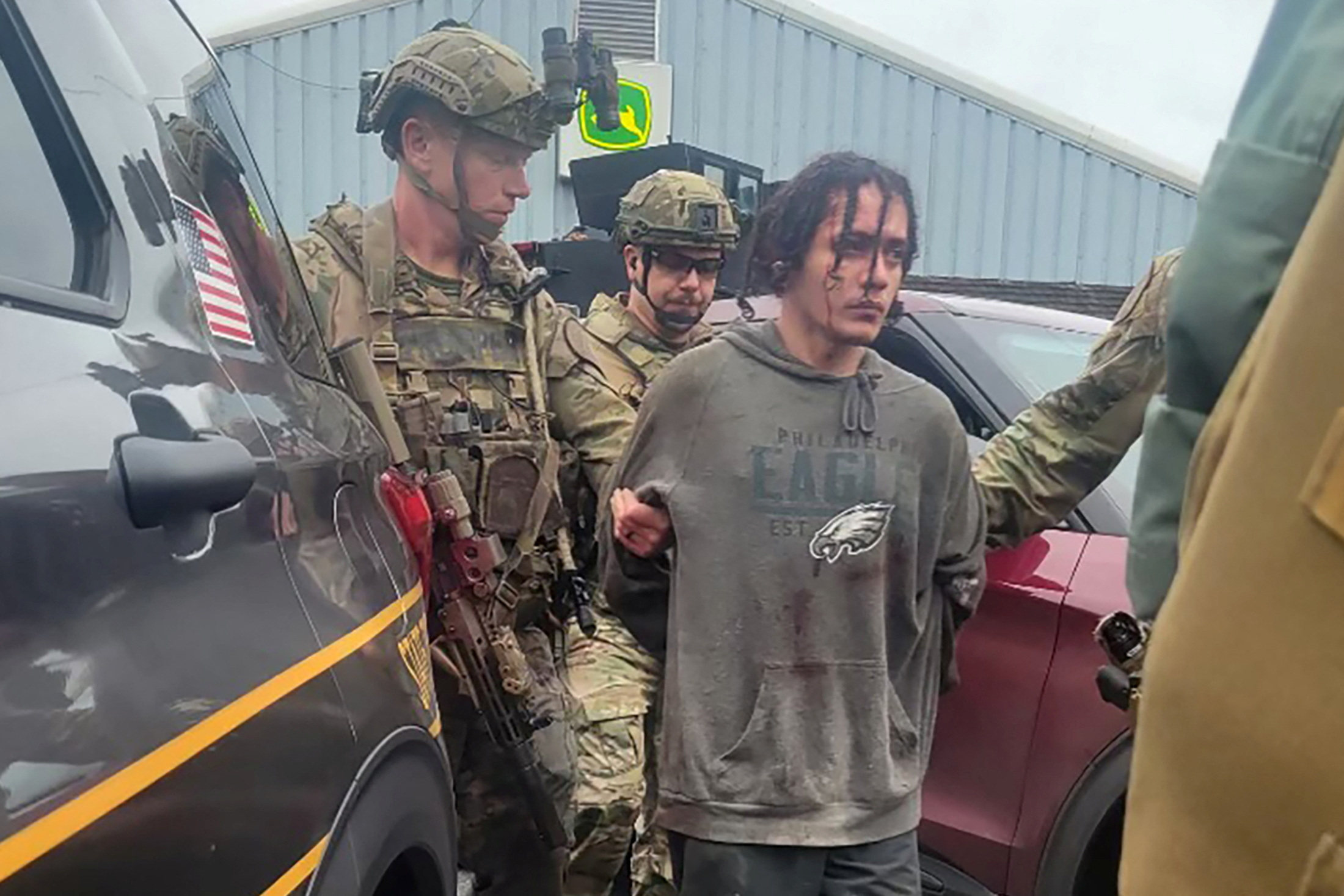 Escaped fugitive Danelo Cavalcante is taken into custody by law enforcement officers in Pennsylvania. Photo: Pennsylvania State Police/Handout via Reuters