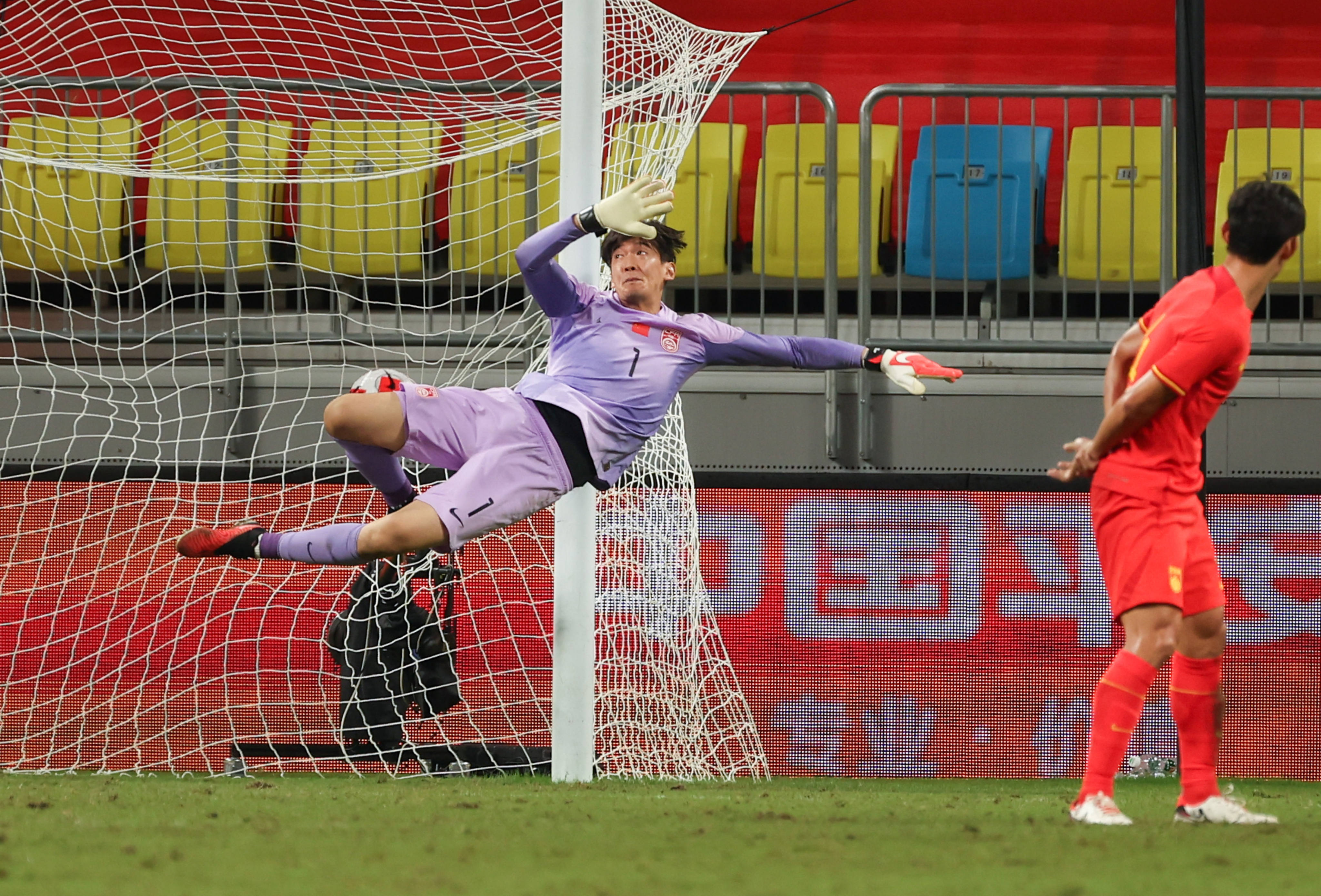 China goalkeeper Yan Junling is powerless to stop Thae Krouma’s long-range effort from going into the hosts’ net in their 1-0 defeat by Syria. Photo: Xinhua