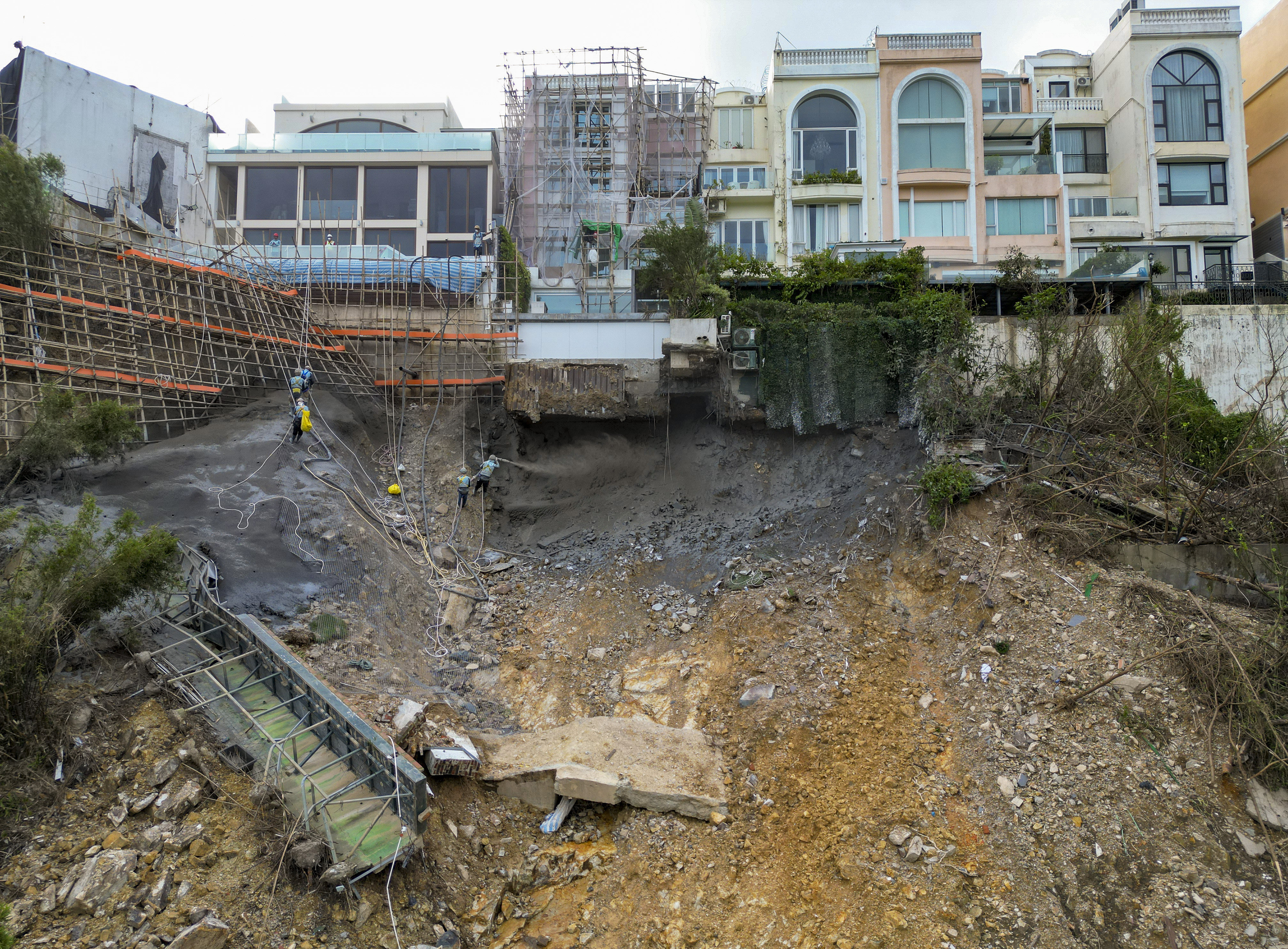 Part of the slope at Redhill Peninsula estate collapsed after the record rainfall last week. Photo: Sam Tsang