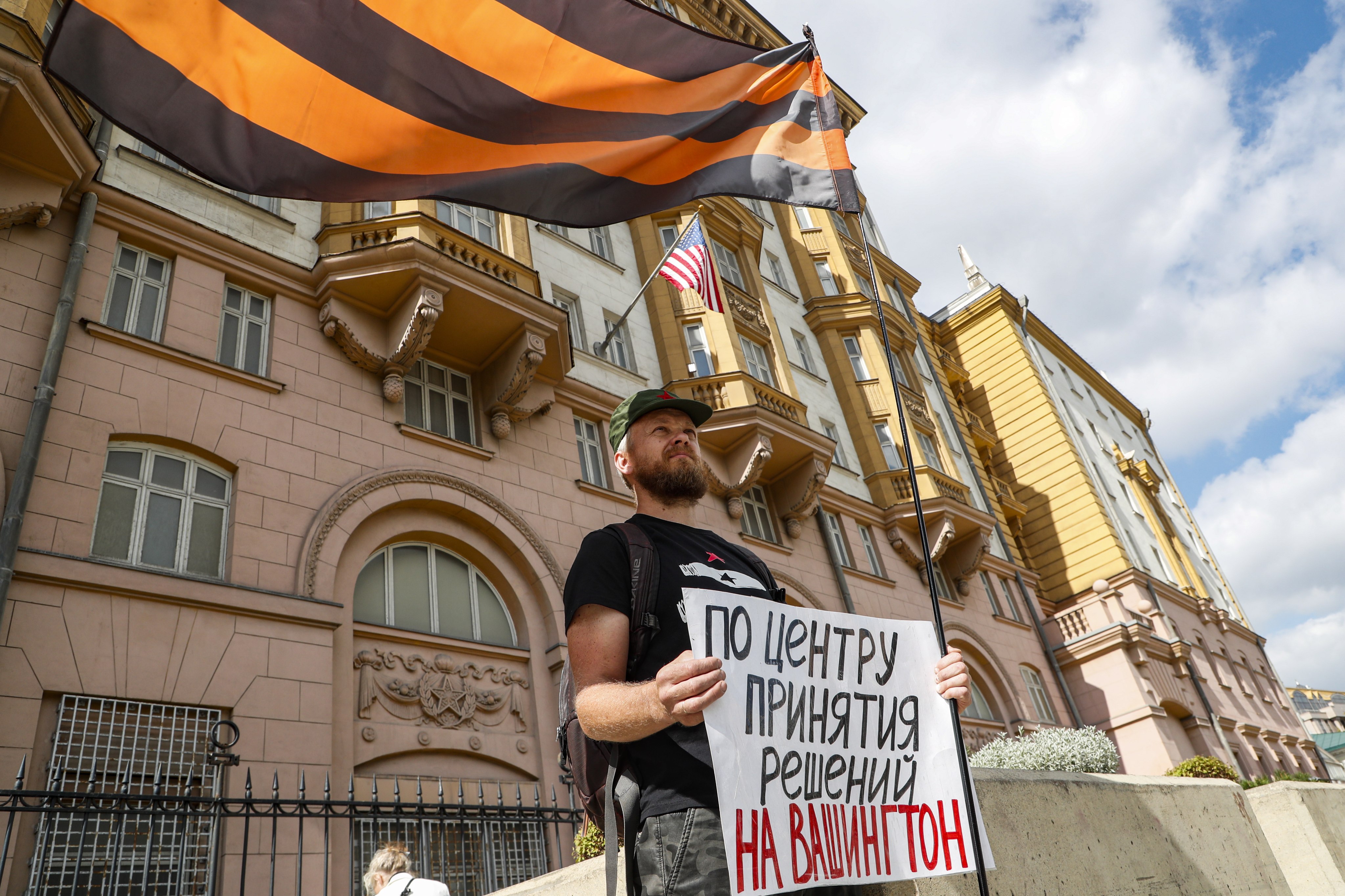 A man stands outside the US embassy in Moscow, where Robert Shonov, a former employee of the US Consulate General in Vladivostok, was detained. Photo: EPA-EFE