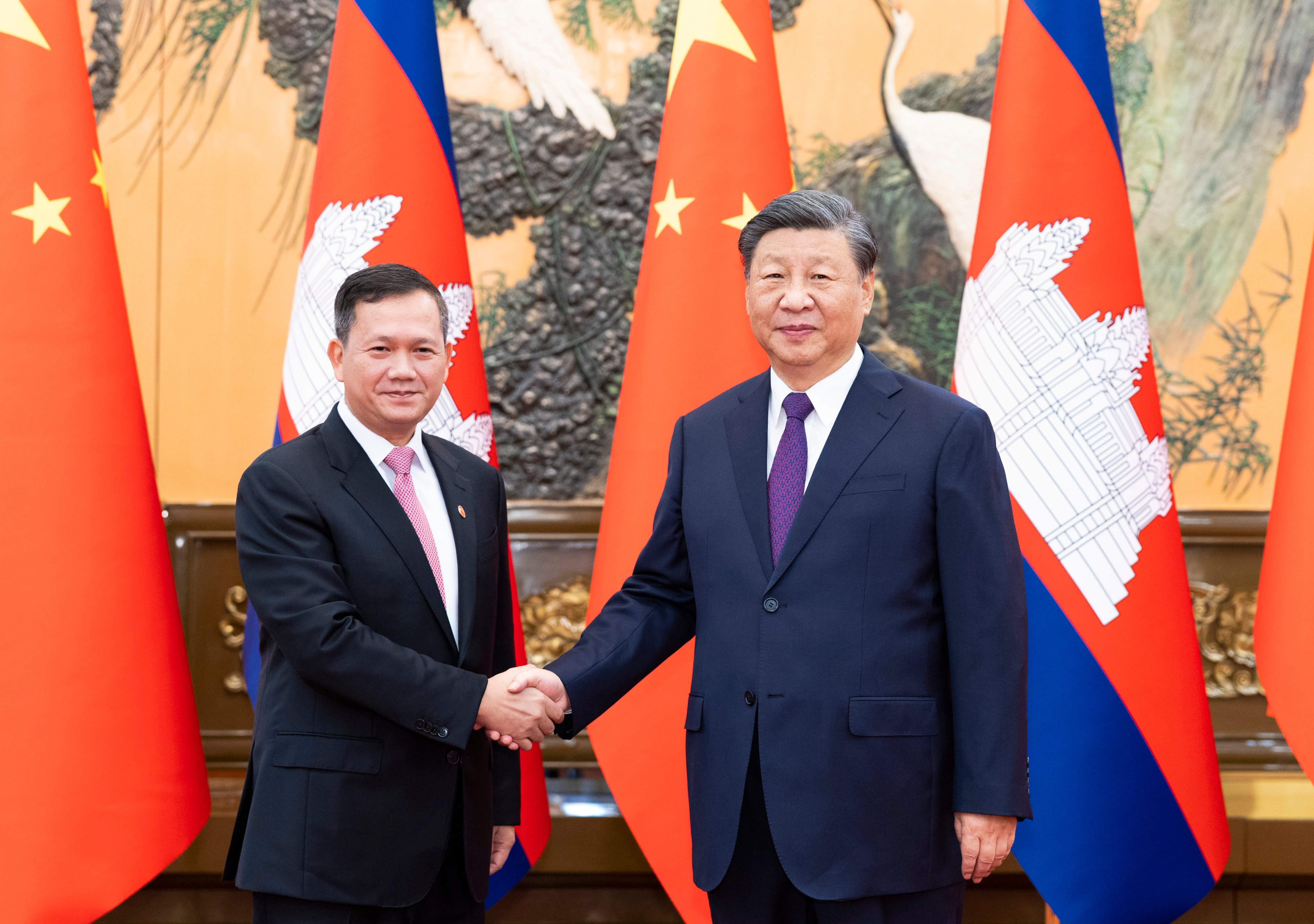 Cambodian Prime Minister Hun Manet (left) shakes hands with Chinese President Xi Jinping during a welcome ceremony in Beijing on Friday. Photo: Xinhua
