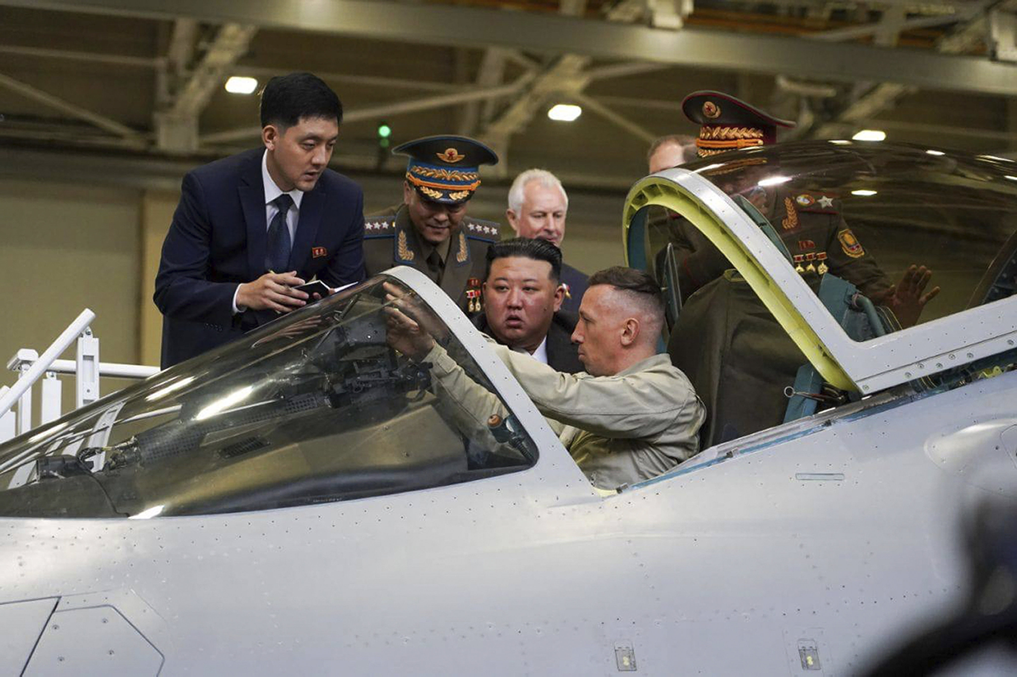 North Korean leader Kim Jong-un looks at a military jet cockpit while visiting a Russian aircraft plant in Komsomolsk-on-Amur, about 6,200km east of Moscow. Photo: AP