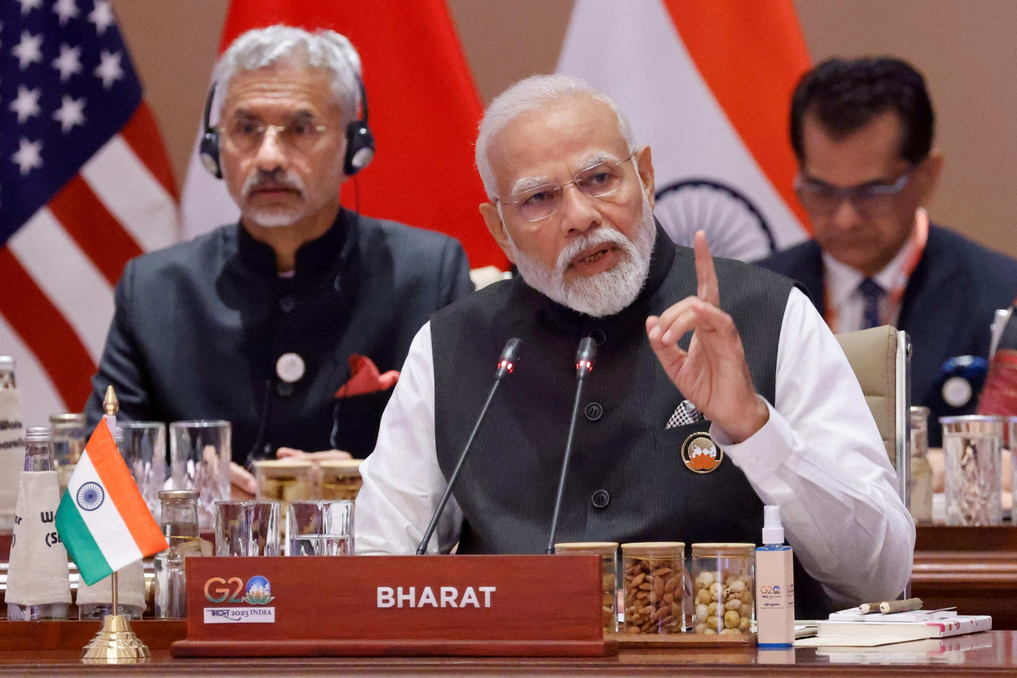 Indian Prime Minister Narendra Modi  speaks from a desk bearing the name Bharat during the G20 Leaders’ Summit in New Delhi on September 9. Photo: Pool/AFP