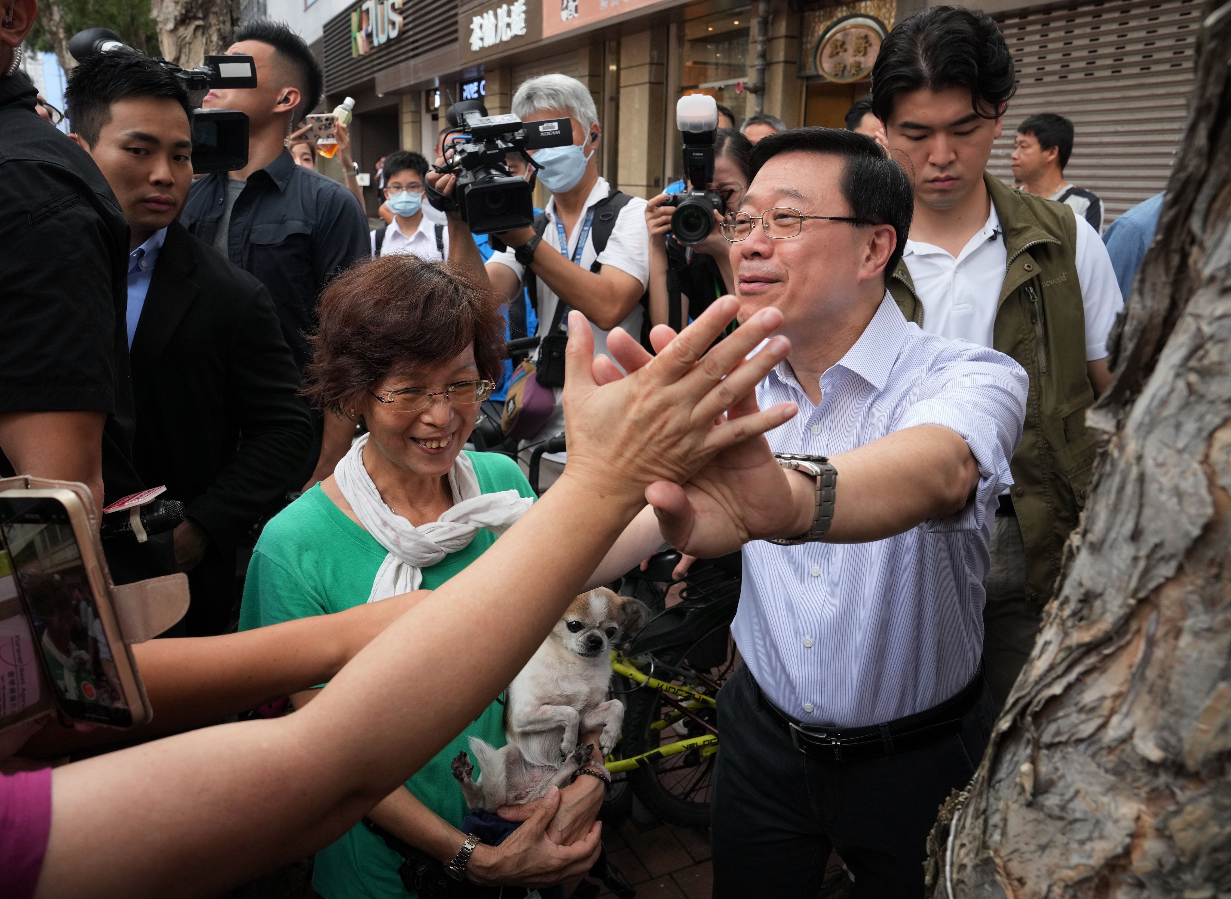 Chief Executive John Lee in  Yuen Long, the second stop in a series of community tours aimed at gauging public views. Photo: Elson Li