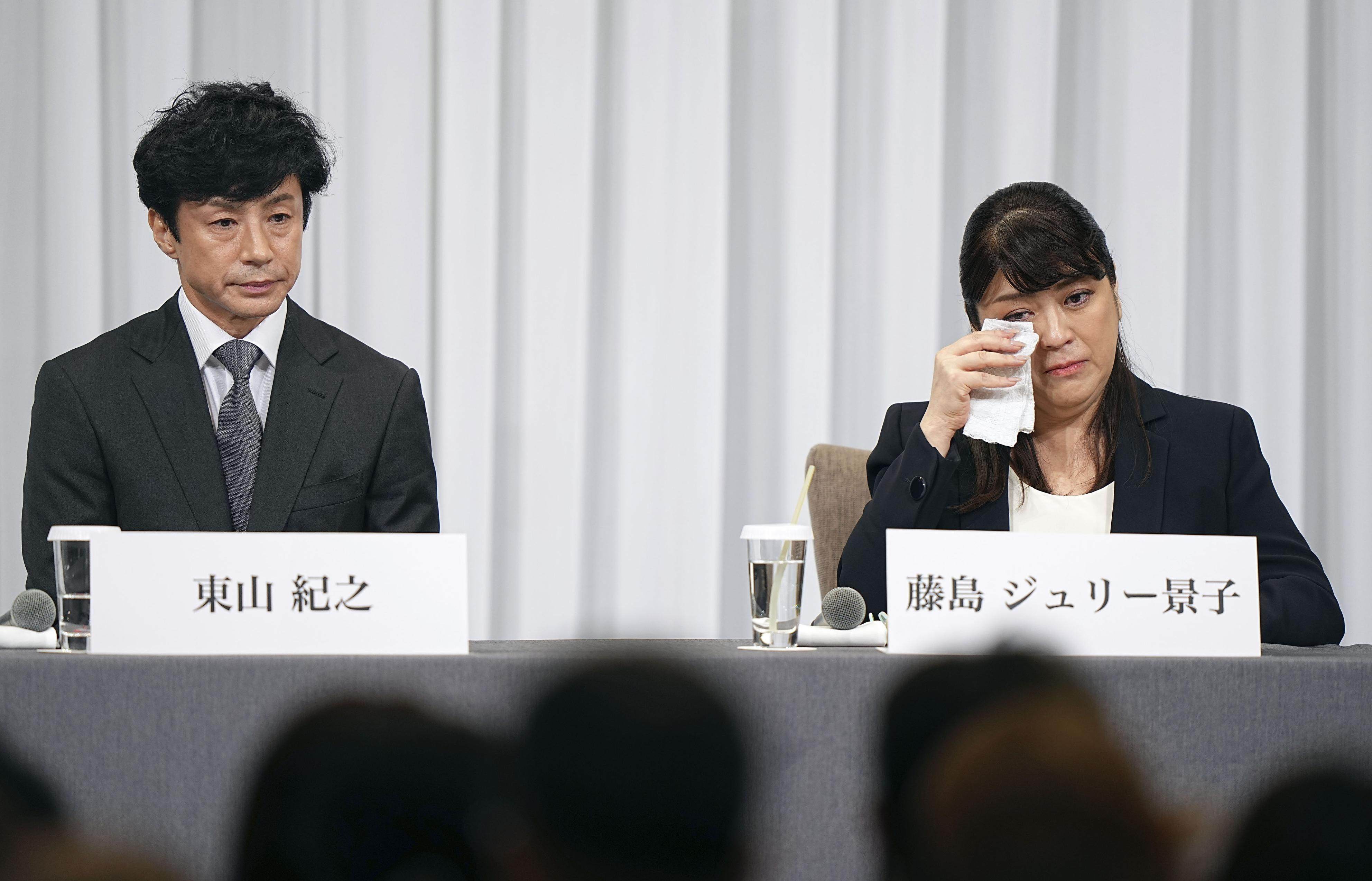 Julie Keiko Fujishima, former president of Johnny and Associates, wipes away tears during a Tokyo press conference on September 7, amid allegations of child sexual abuse by the agency’s late founder and her uncle, Johnny Kitagawa. Beside her is the agency’s new president, Noriyuki Higashiyama. Photo: Kyodo