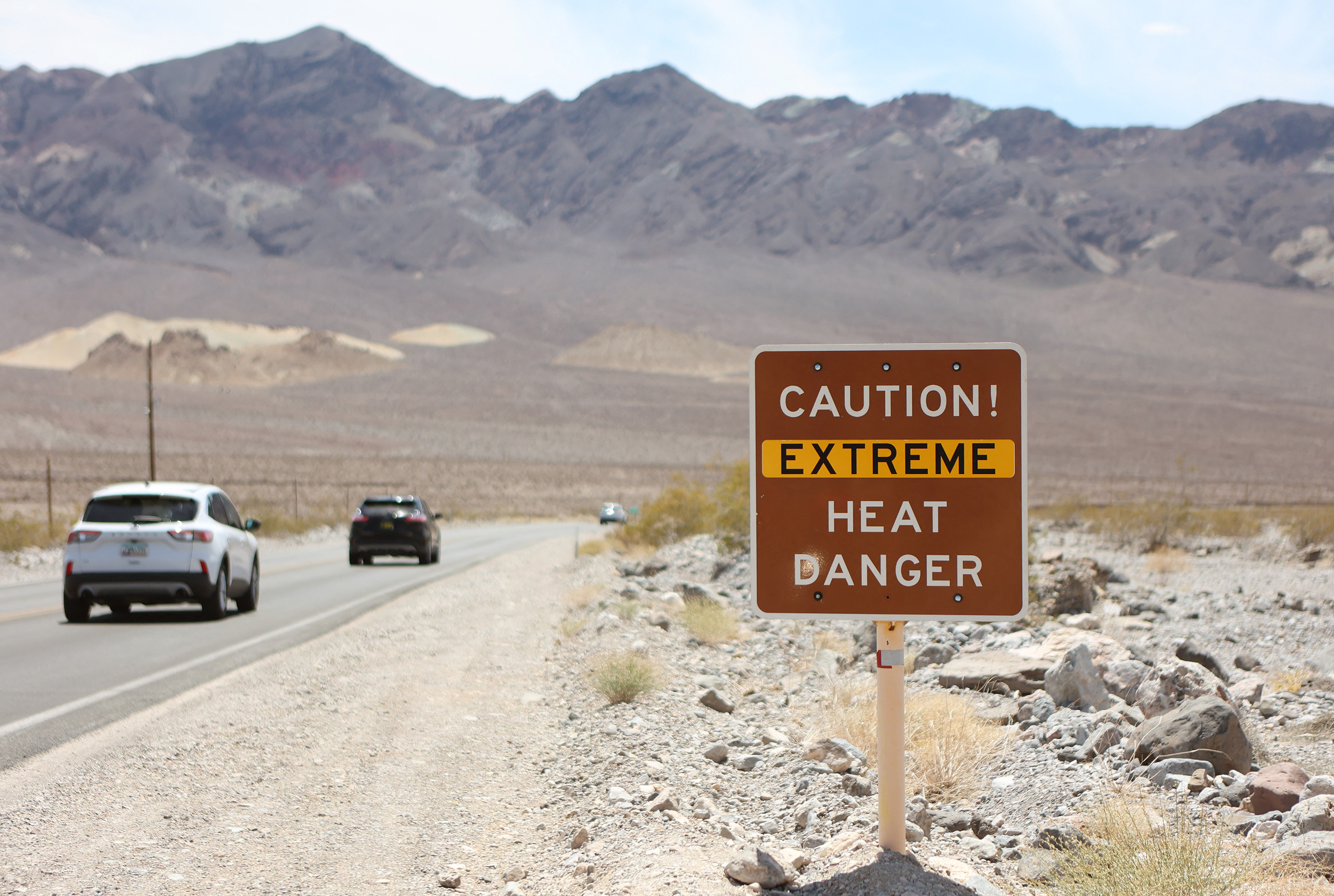 A heat advisory sign is shown along US highway 190 during a heat wave in Death Valley National Park in Death Valley, California, on July 16. Record temperatures across the United States have brought the urgency of the climate crisis into focus, but a Republican plan for sweeping government reform threatens to undo progress in the climate change fight and supercharge carbon emissions. Photo: AFP