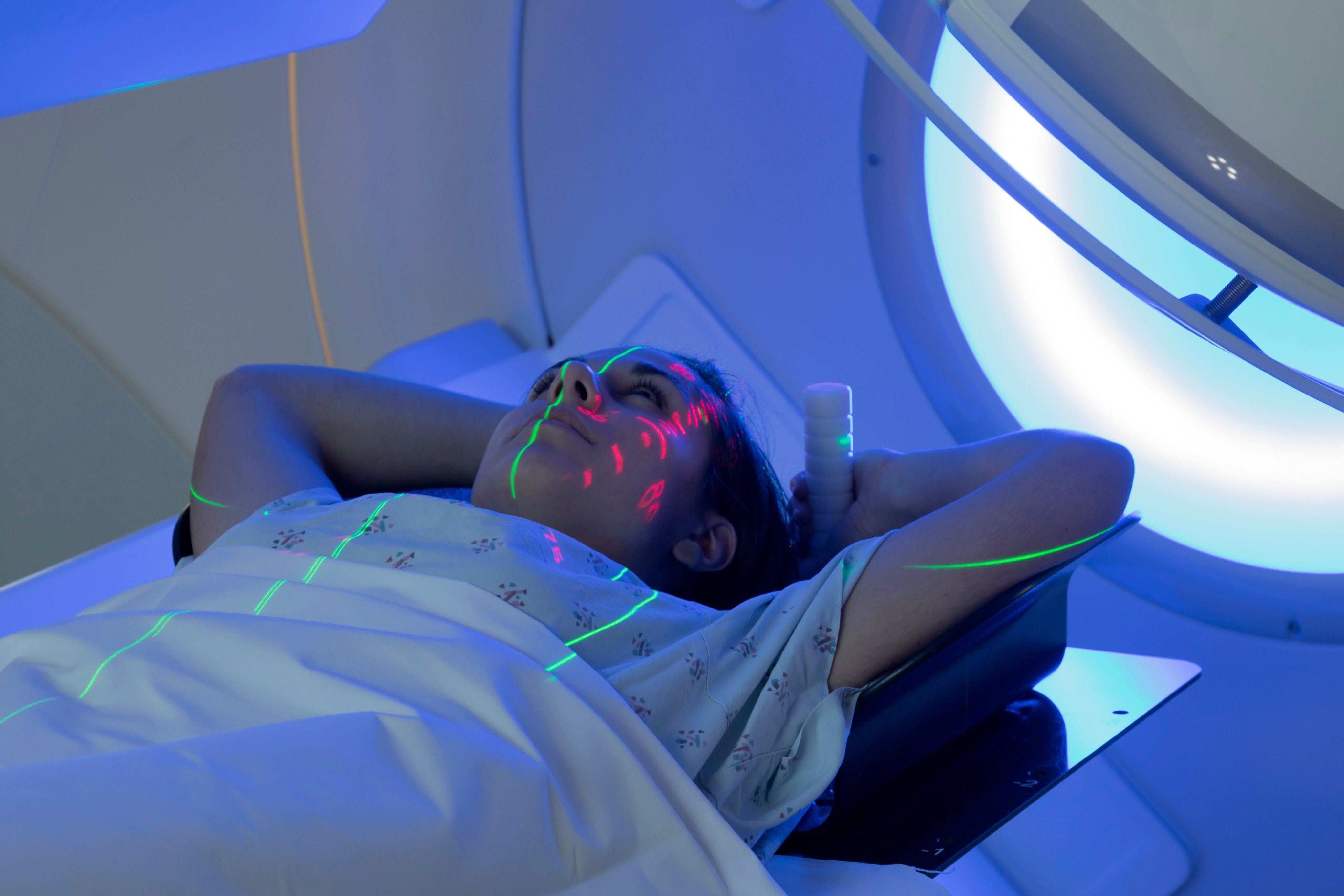 A woman receives radiation therapy treatment for cancer. Confusing interactions and a lack of communication between public and private healthcare providers are making some Hongkongers less willing to seek early treatment for cancer and other diseases. Photo: Shutterstock