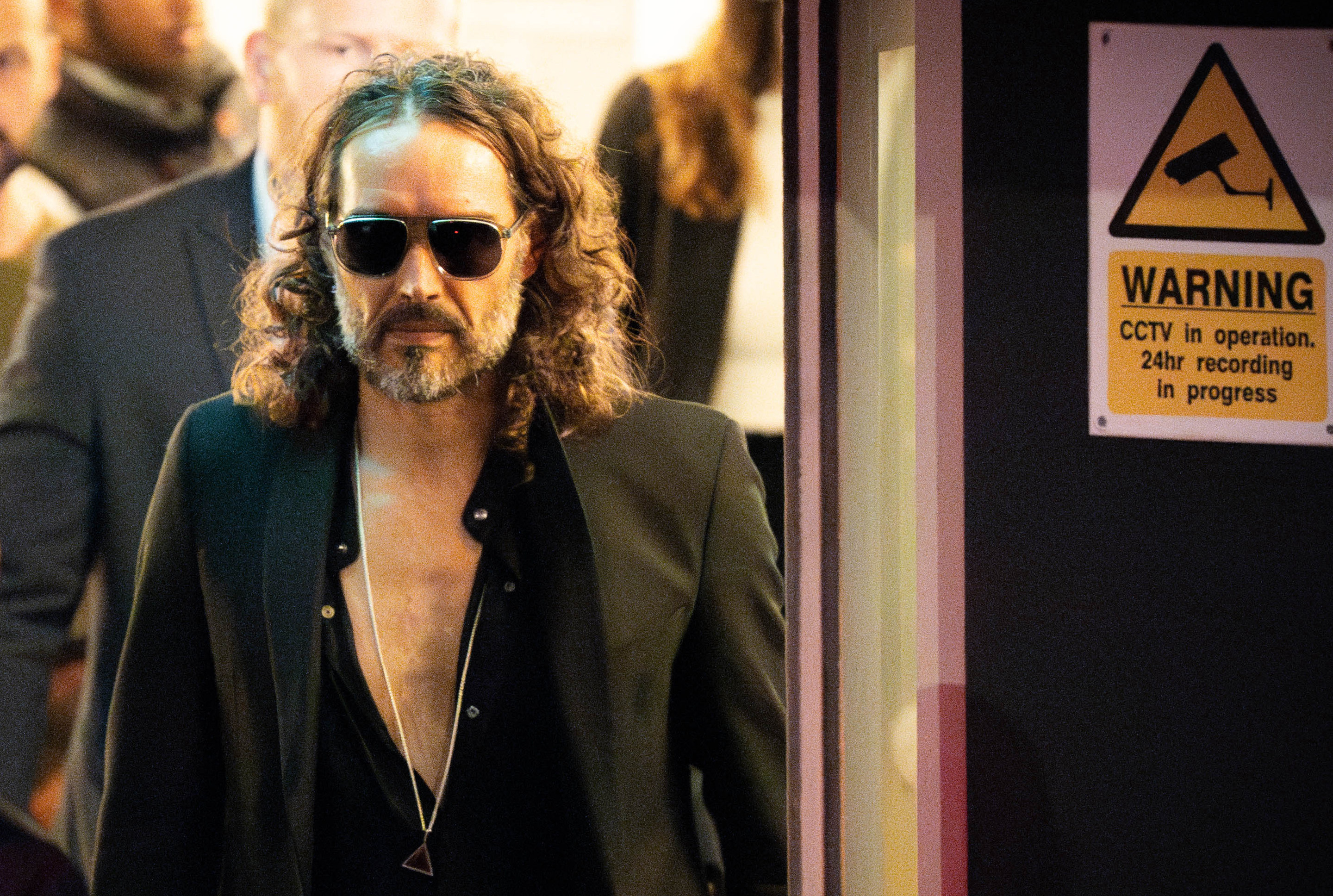 Russell Brand leaves the Troubabour Wembley Park theatre in northwest London after performing a comedy set. Photo: PA Wire/dpa