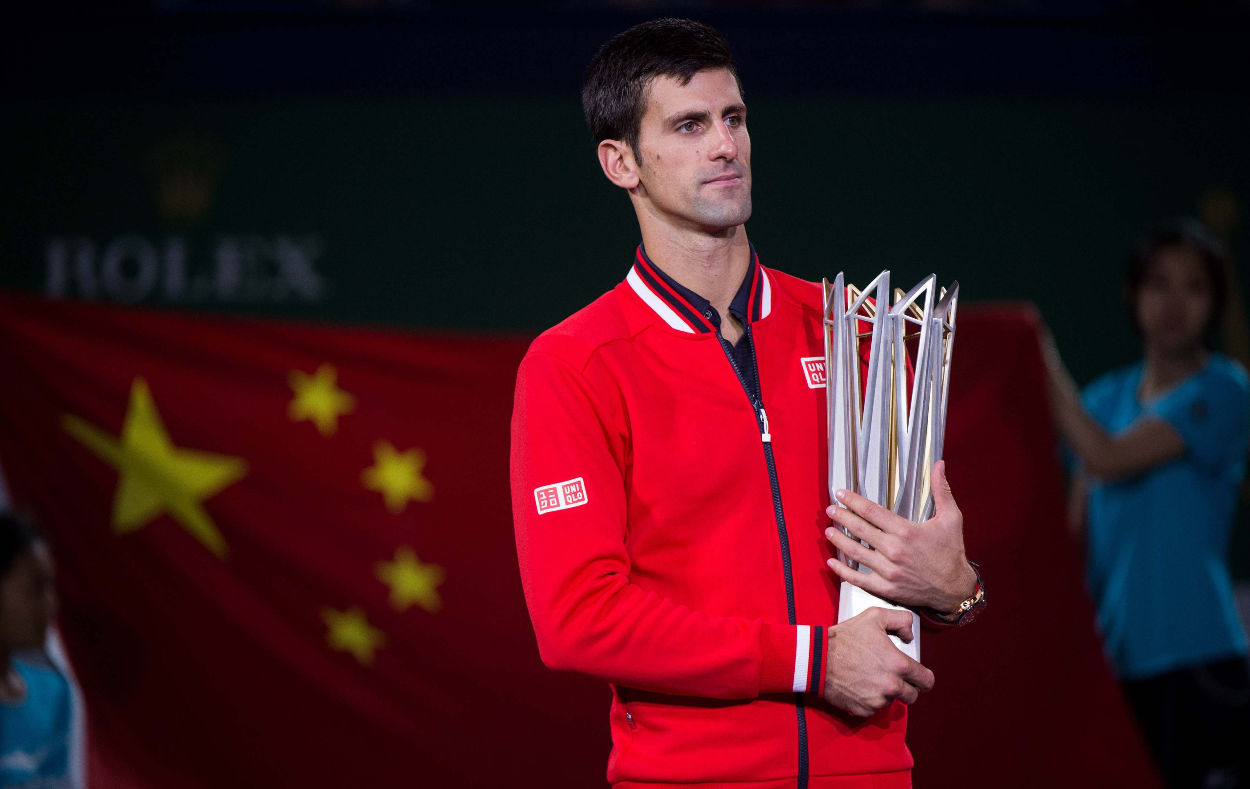Novak Djokovic holds his trophy after winning the 2015 Shanghai Masters final. Photo: AFP