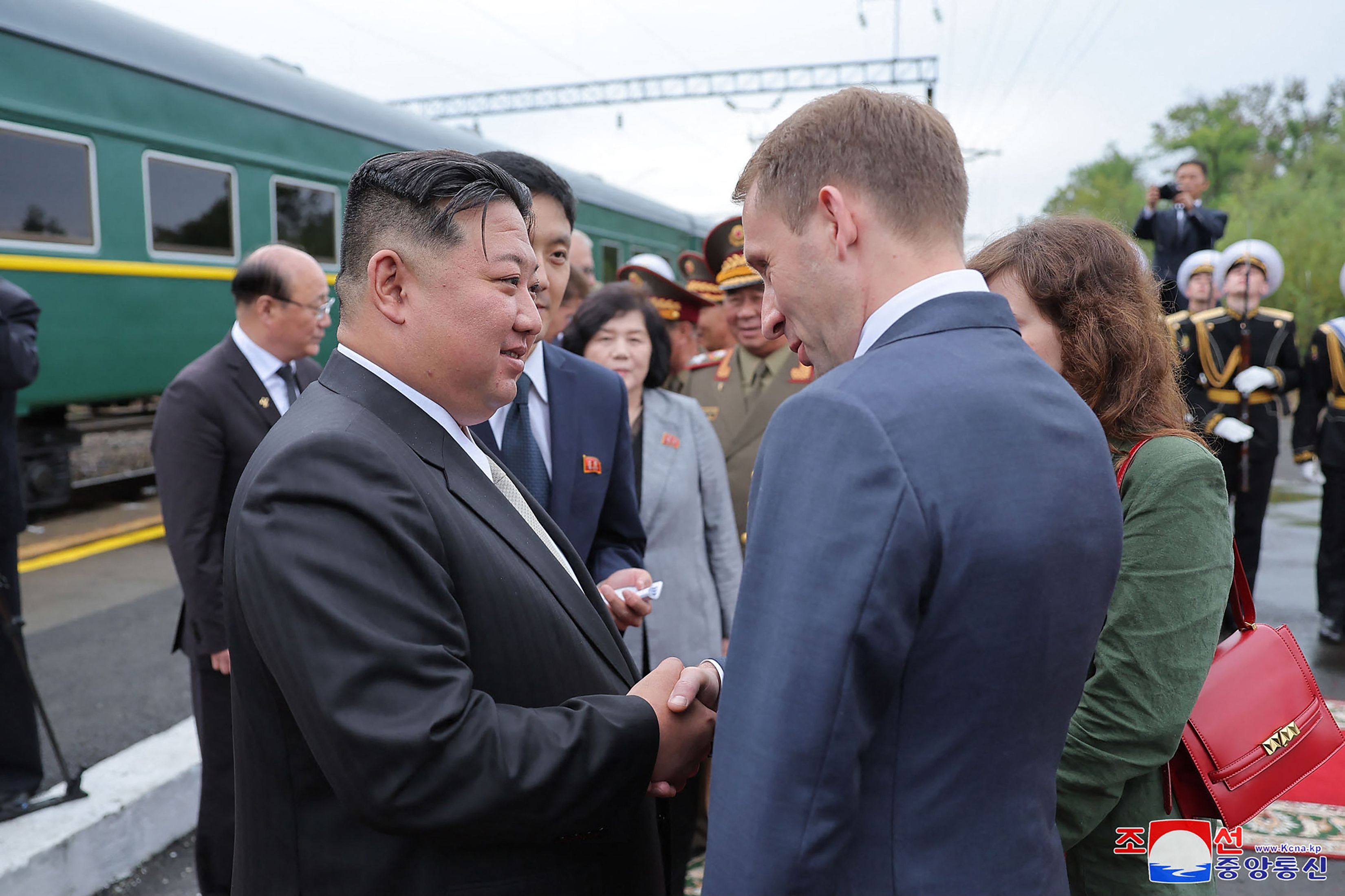 North Korea’s Kim Jong-un shakes hands with Russian natural-resources minister Alexander Kozlov during a farewell ceremony at a railway station near Vladivostok. Photo: KCNA VIA KNS / AFP