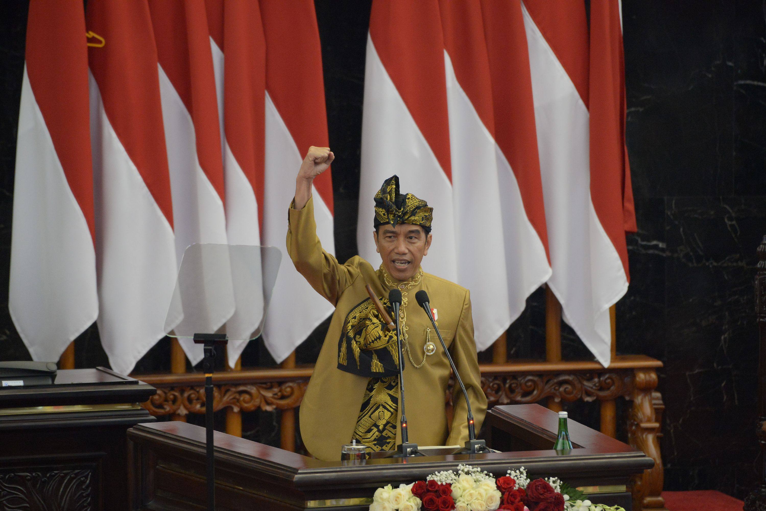 Indonesia’s President Joko Widodo gestures during his state-of-the-nation address in 2019. Widodo has not been discreet about his intentions in determining his successor. Photo: AFP