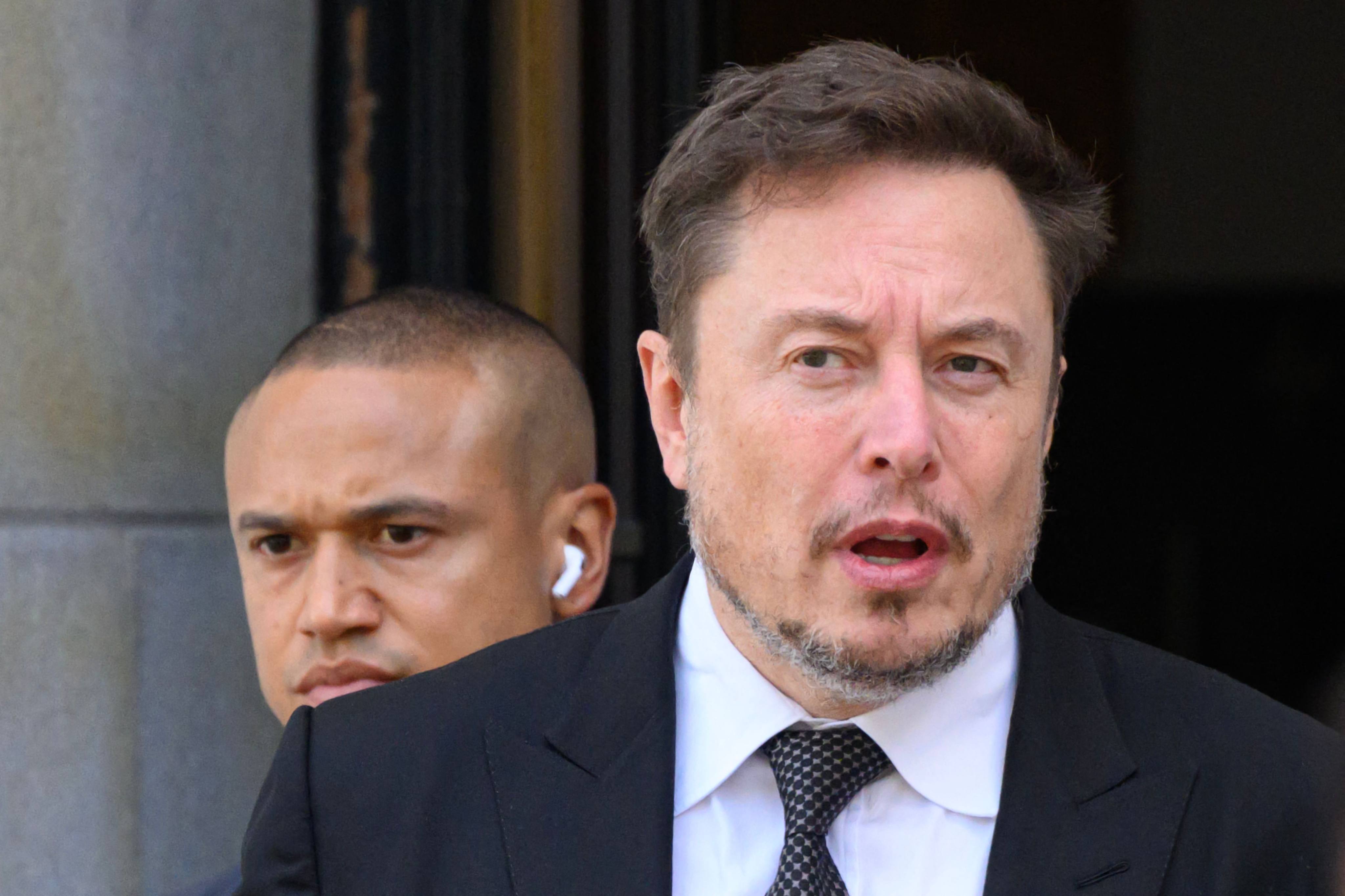 X (formerly Twitter) CEO Elon Musk leaves an Artificial Intelligence forum in Washington on Wednesday. Photo: AFP