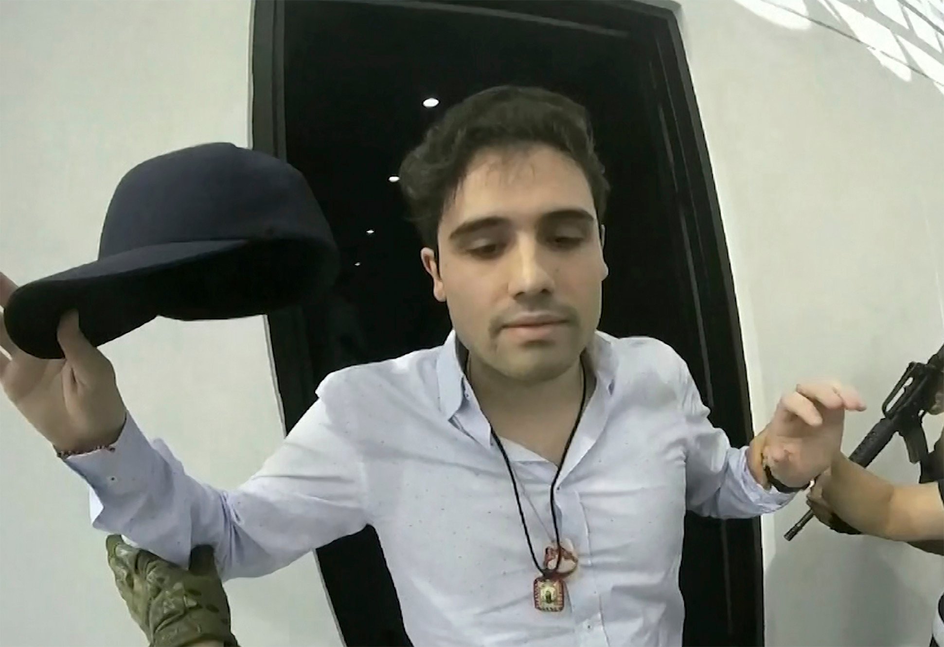 A screen grab from video, provided by the Mexican government, shows Ovidio Guzman being detained in Culiacan, Mexico in 2019. Guzman pleaded not guilty to US fentanyl trafficking charges on Monday. Photo: CEPROPIE via AP 
