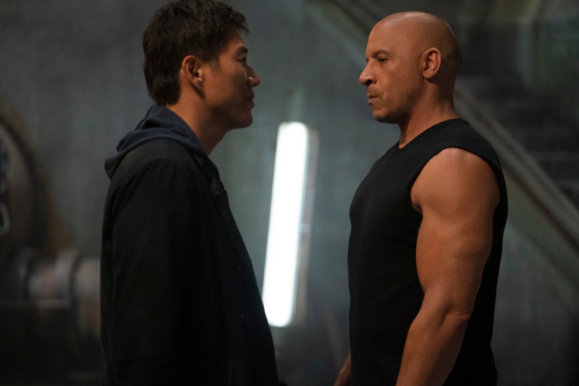 Kang (left) and Vin Diesel in a still from “Fast & Furious 9”.