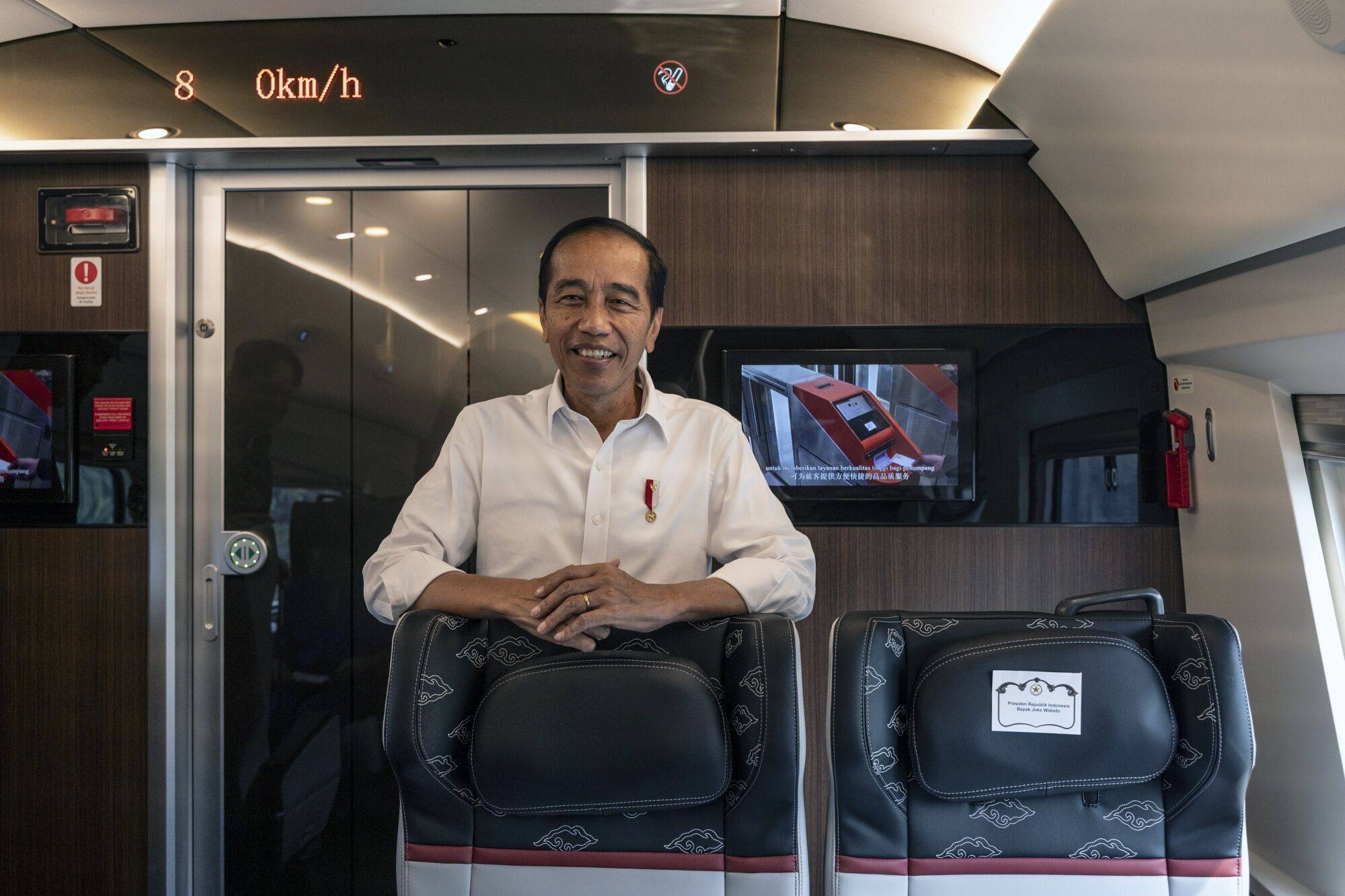 Indonesian President Joko Widodo pictured on board a Jakarta-Bandung High-Speed Railway train in Bandung on Tuesday. Photo: Bloomberg