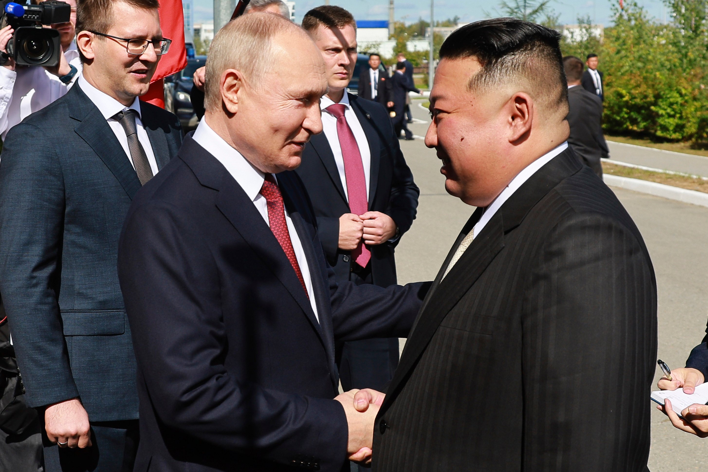 Russian President Vladimir Putin and North Korean leader Kim Jong-un shake hands at the Vostochny Cosmodrome on September 13. Putin does not appear to have ruled out military cooperation with Pyongyang. Photo: AP