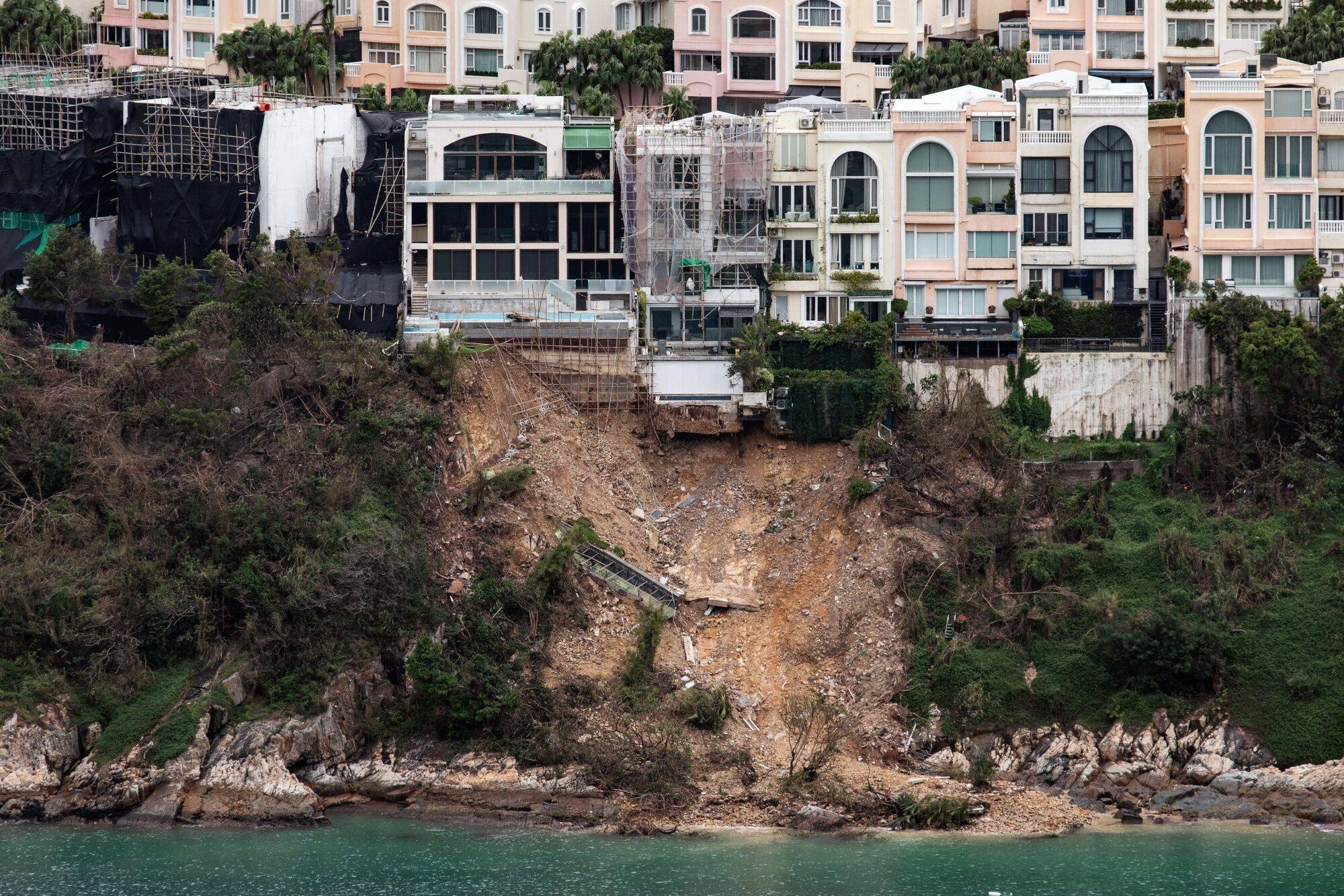 Debris from a landslide below the Redhill Peninsula residential development in Hong Kong, as seen on September 12. While Hong Kong fumbles its way to a pragmatic solution to the problem of illegal building works, a good place to start might be to restore credibility to enforcement. Photo: Bloomberg