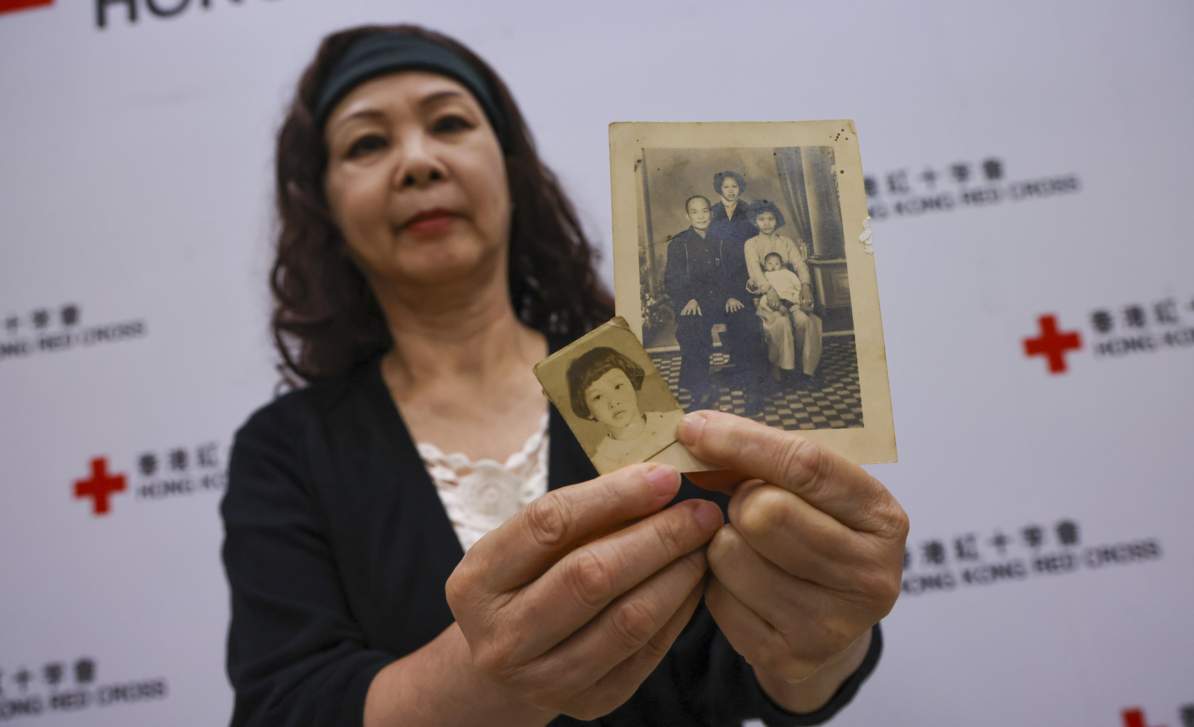 Lam Sui-fun, 68, who has launched a search to find her biological family, after almost 60 years, with a photo of her adoptive parents. Photo: May Tse