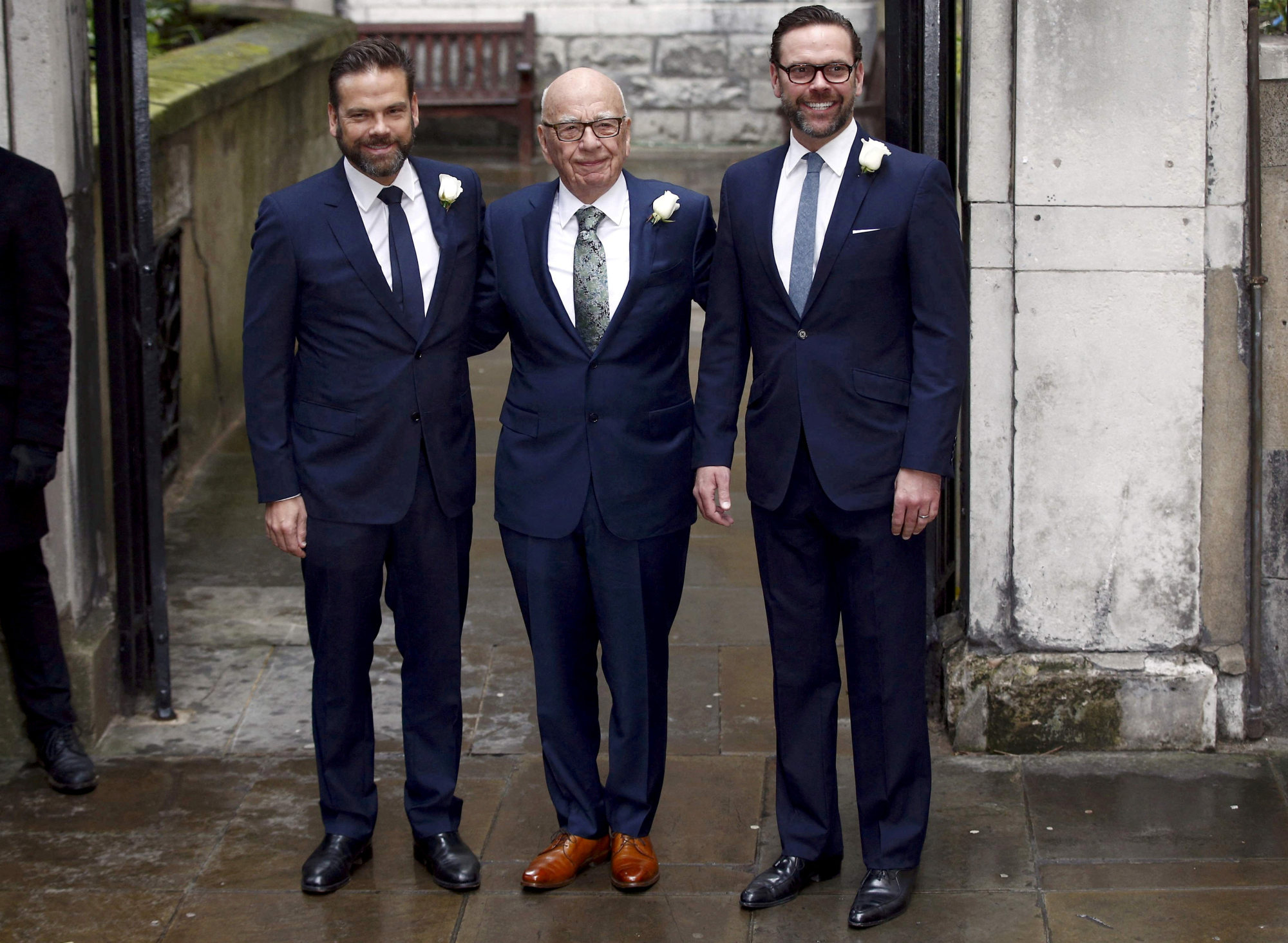 Media mogul Rupert Murdoch poses for a photograph with his sons Lachlan and James. Photo: Reuters