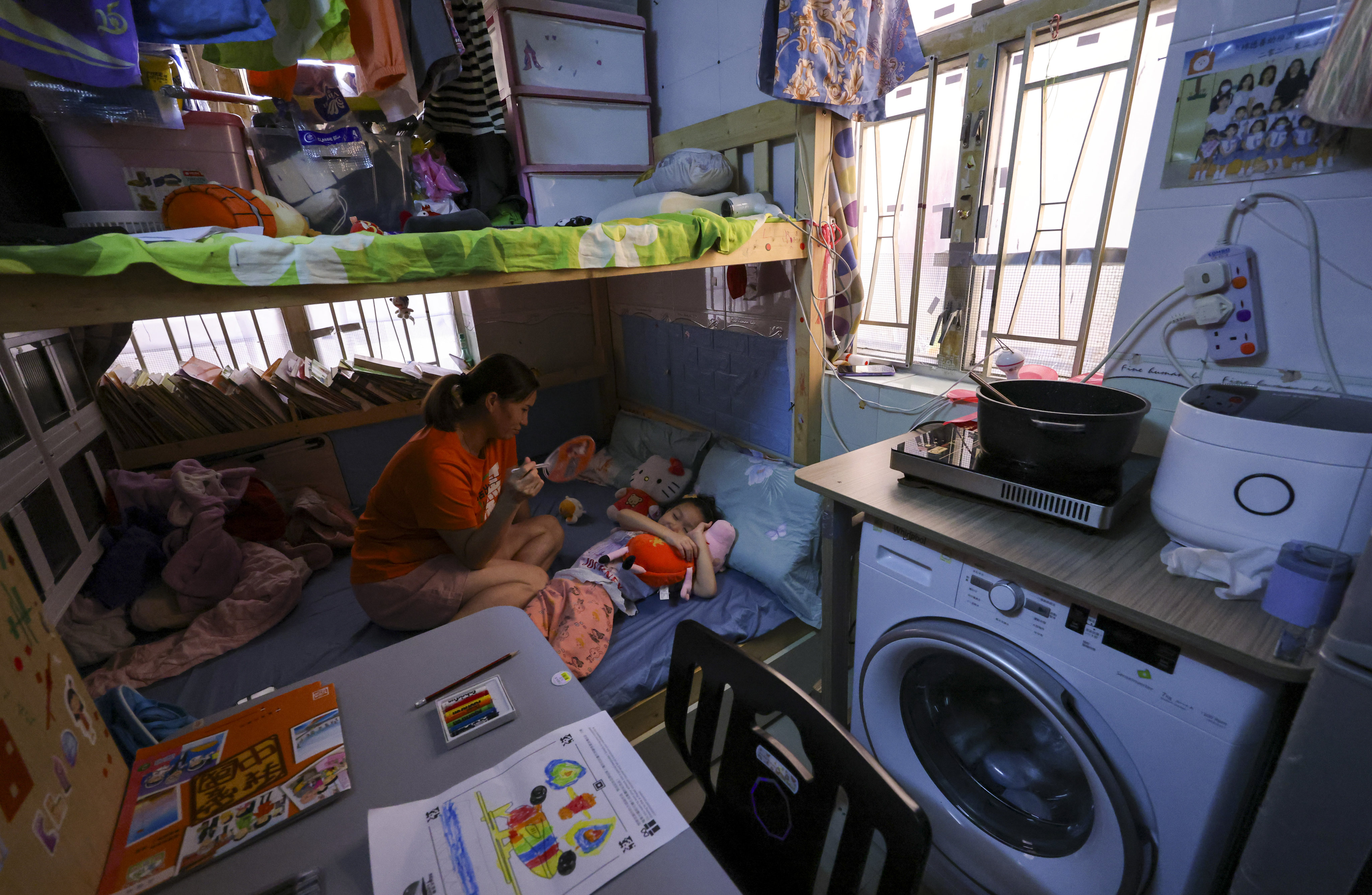 One of Hong Kong’s subdivided flats, home to Cen Xiaoyue and her daughter Ng Oi-ling. Photo: May Tse