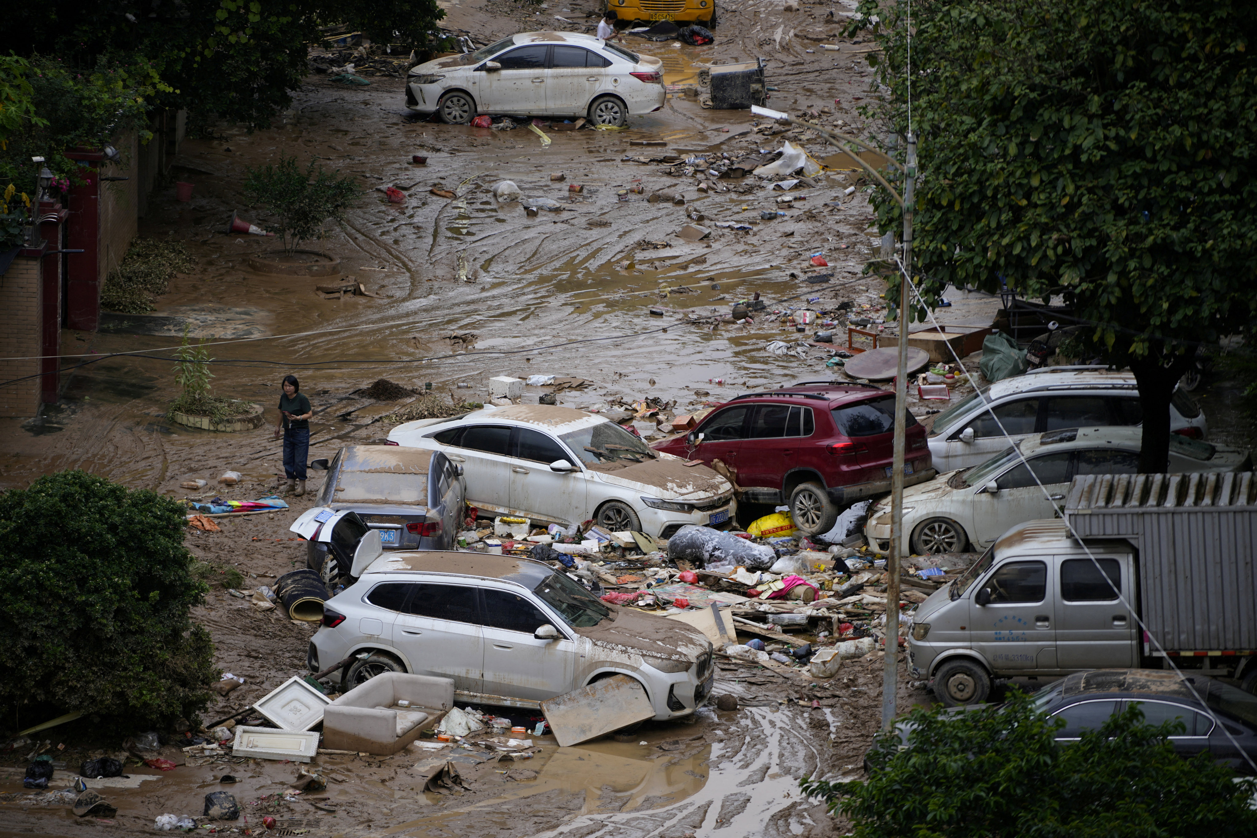 Floods in Dongguan, Guangdong province, on September 9. The HKEX’s new requirements include quantifying the financial effects of climate-related risks. Photo: Reuters