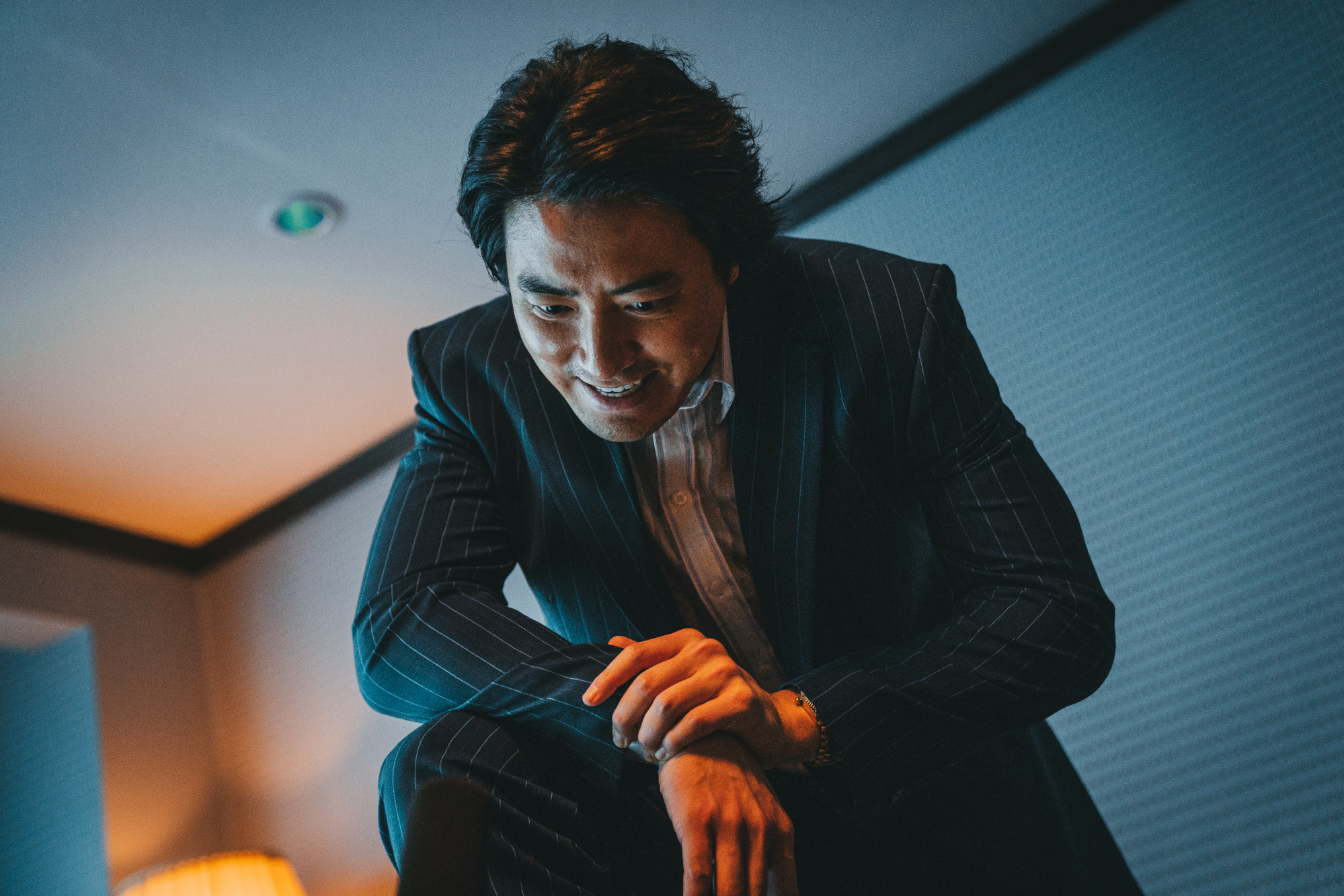 Lee Joon-hyuk as villain Joo Seong-cheol in a still from “The Roundup: No Way Out”.