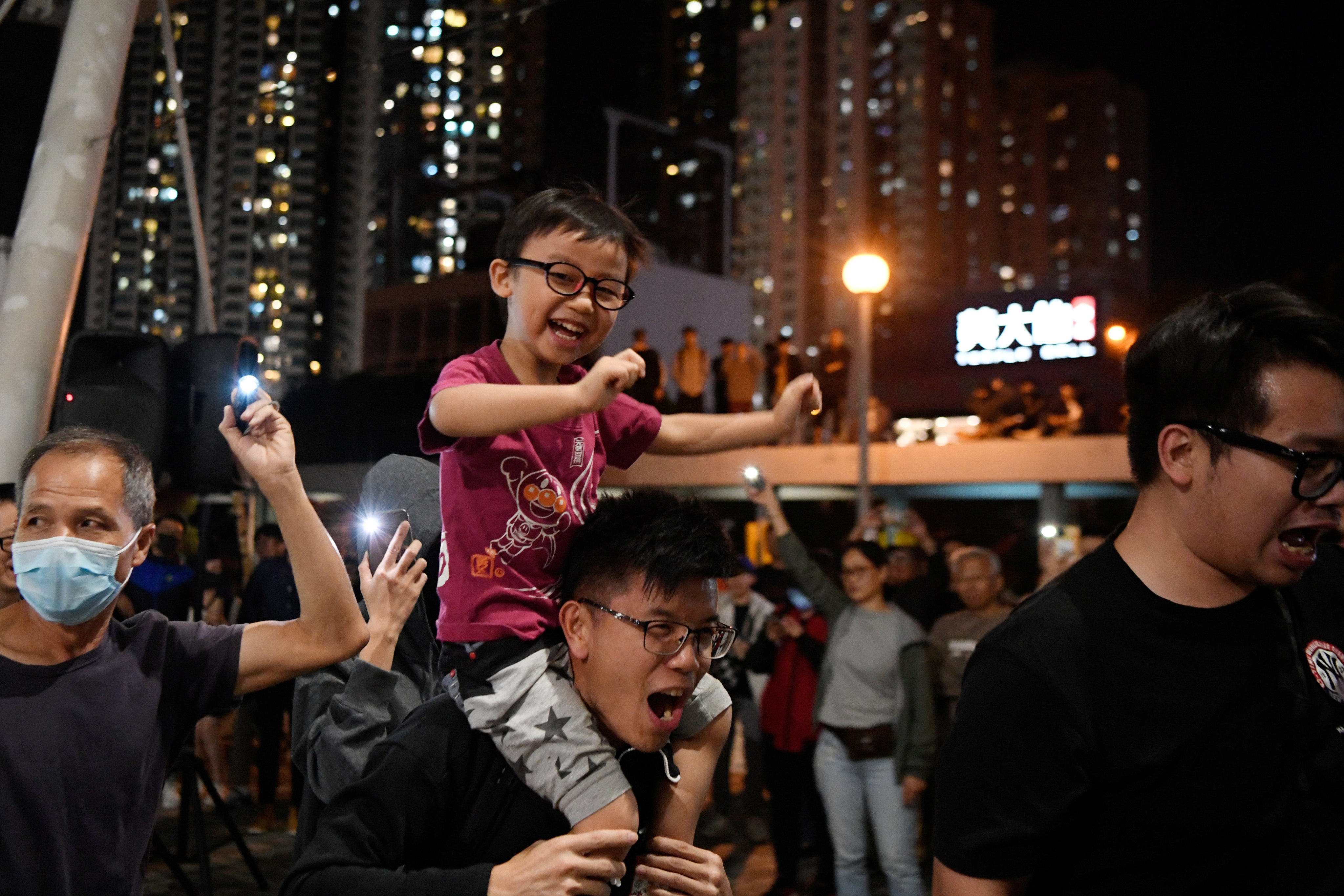 People celebrate the results of the 2019 district council elections in Wong Tai Sin on November 30, which saw pro-democracy parties make big gains. Political apathy is not a state to aspire to, and it doesn’t make governance any less challenging. Photo: Reuters