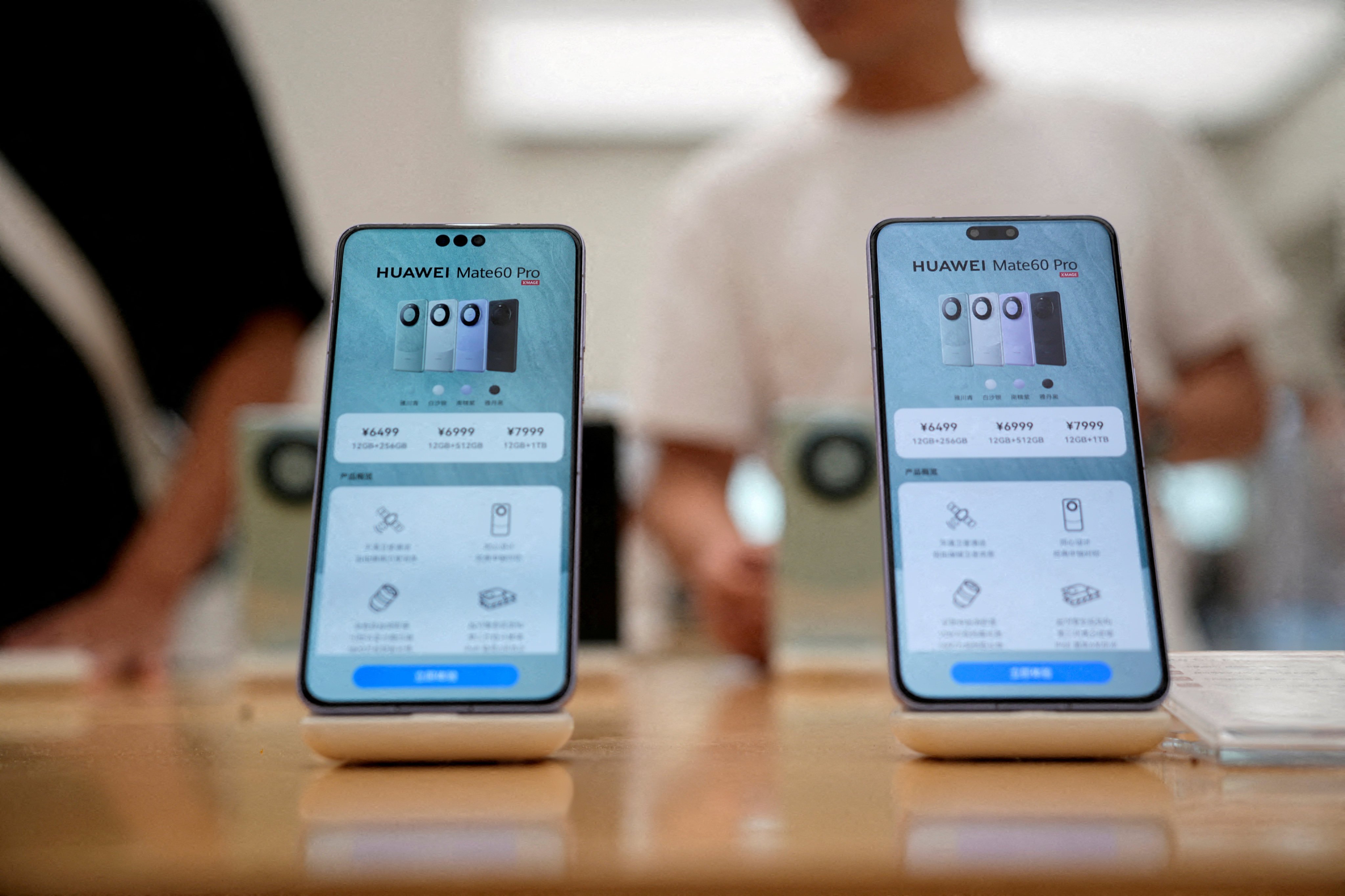 Huawei’s Mate 60 Pro smartphones displayed at a store in Shanghai. Photo: Reuters