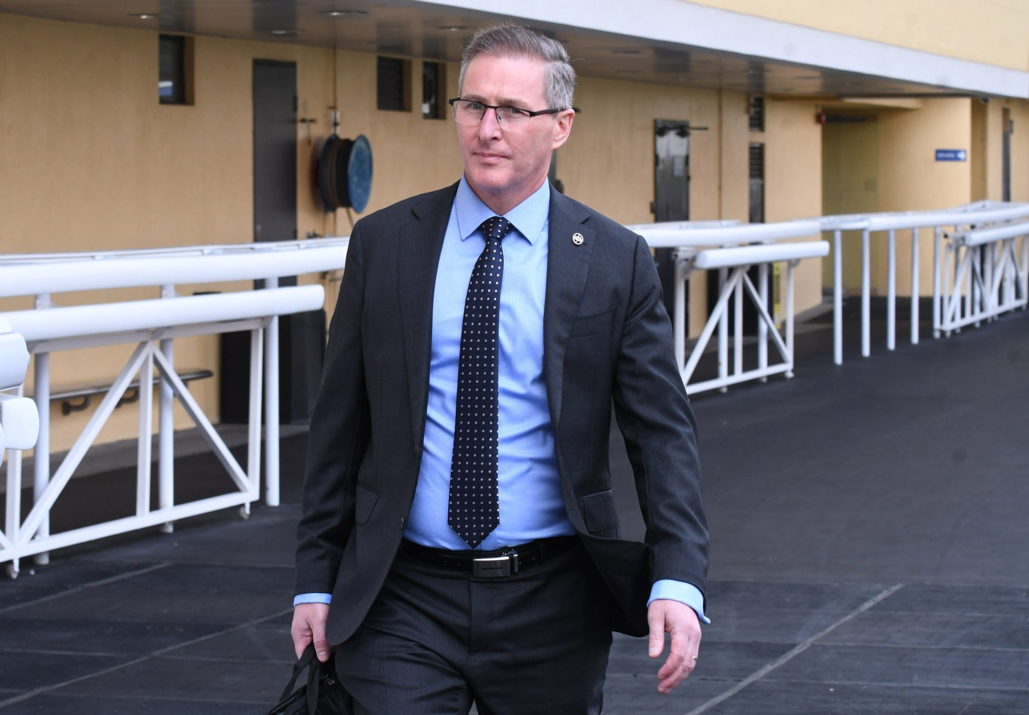 Chief steward Marc van Gestel arrives at a hearing at Happy Valley.