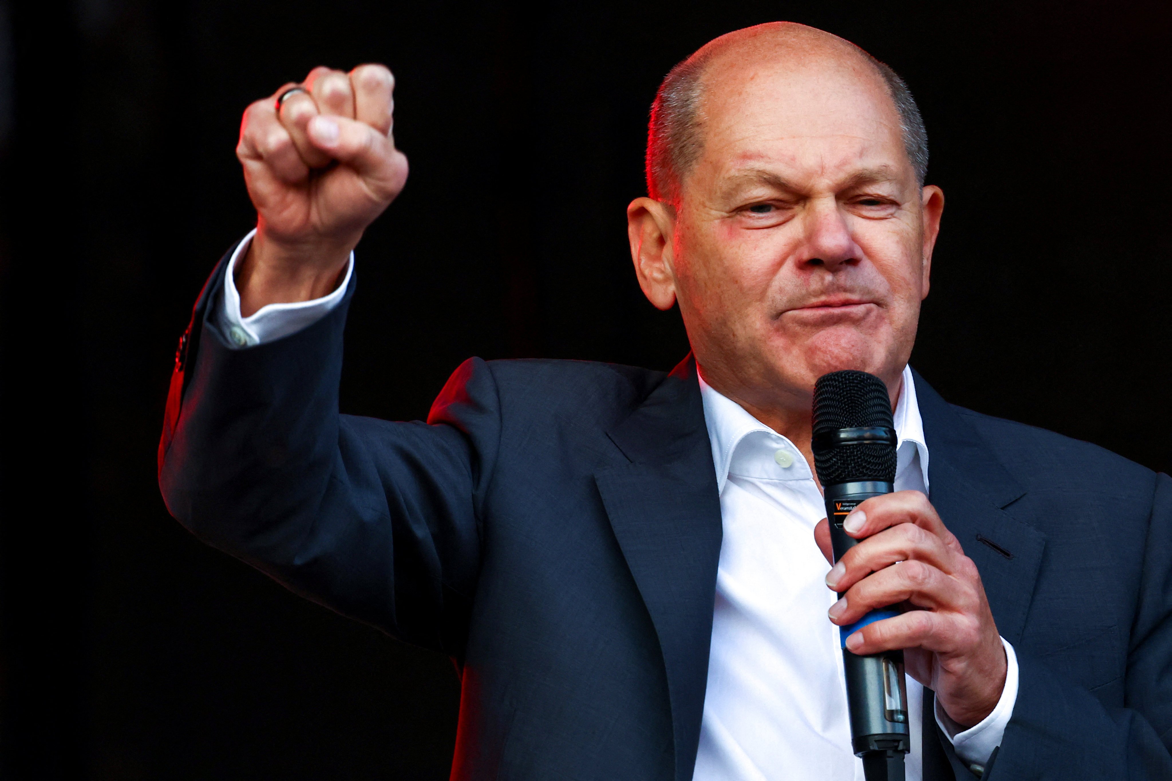 German Chancellor Olaf Scholz speaks at an election campaign rally in Baunatal, Germany on Saturday. Photo: Reuters