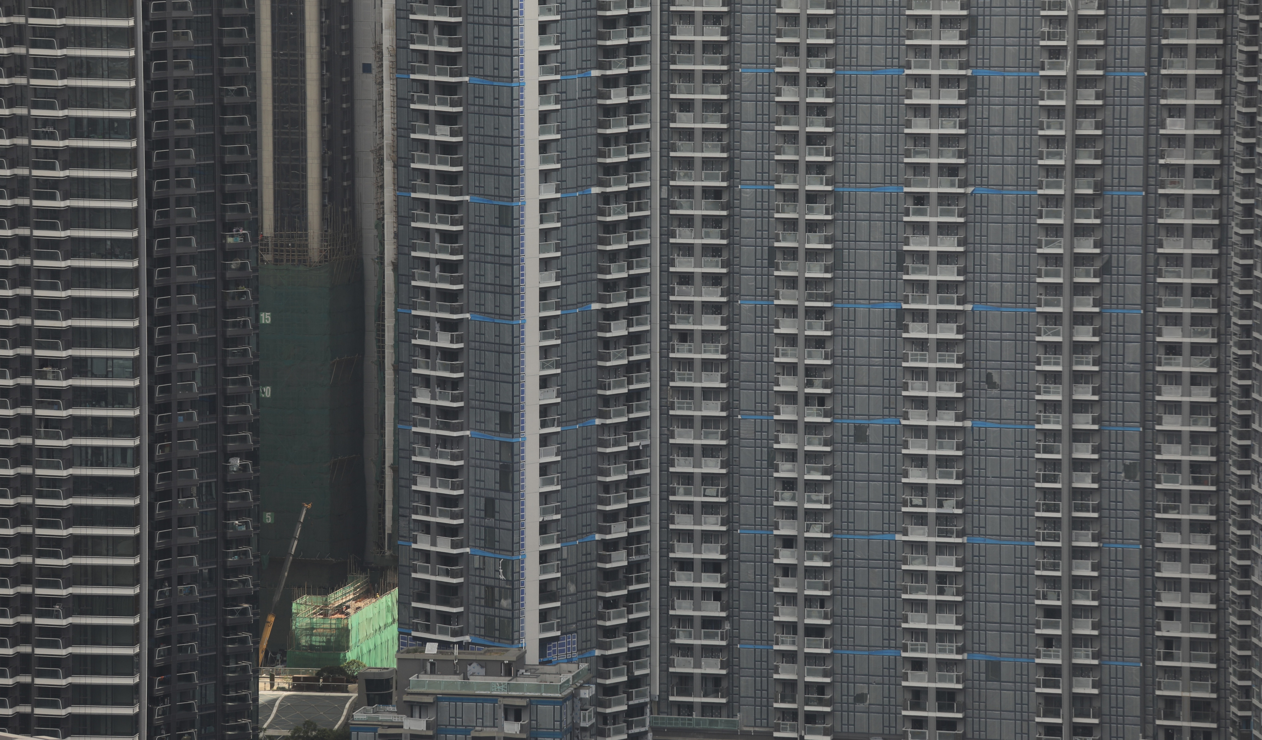 A residential project takes shape in Kai Tak, Hong Kong. The city’s housing market has cooled due to rising interest rates. Photo: Xiaomei Chen